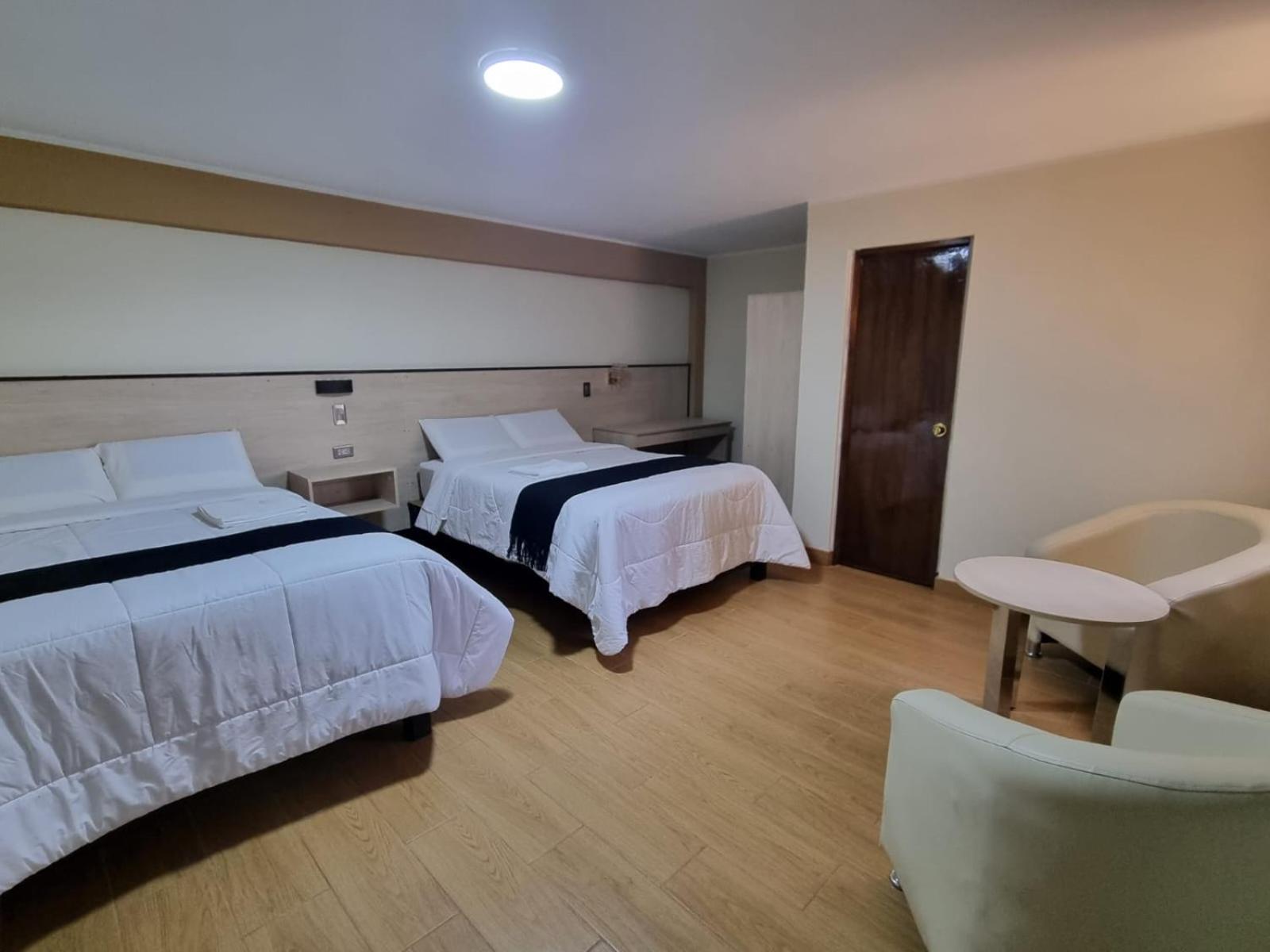 Deluxe Queen Room with Two Queen Beds photo 1