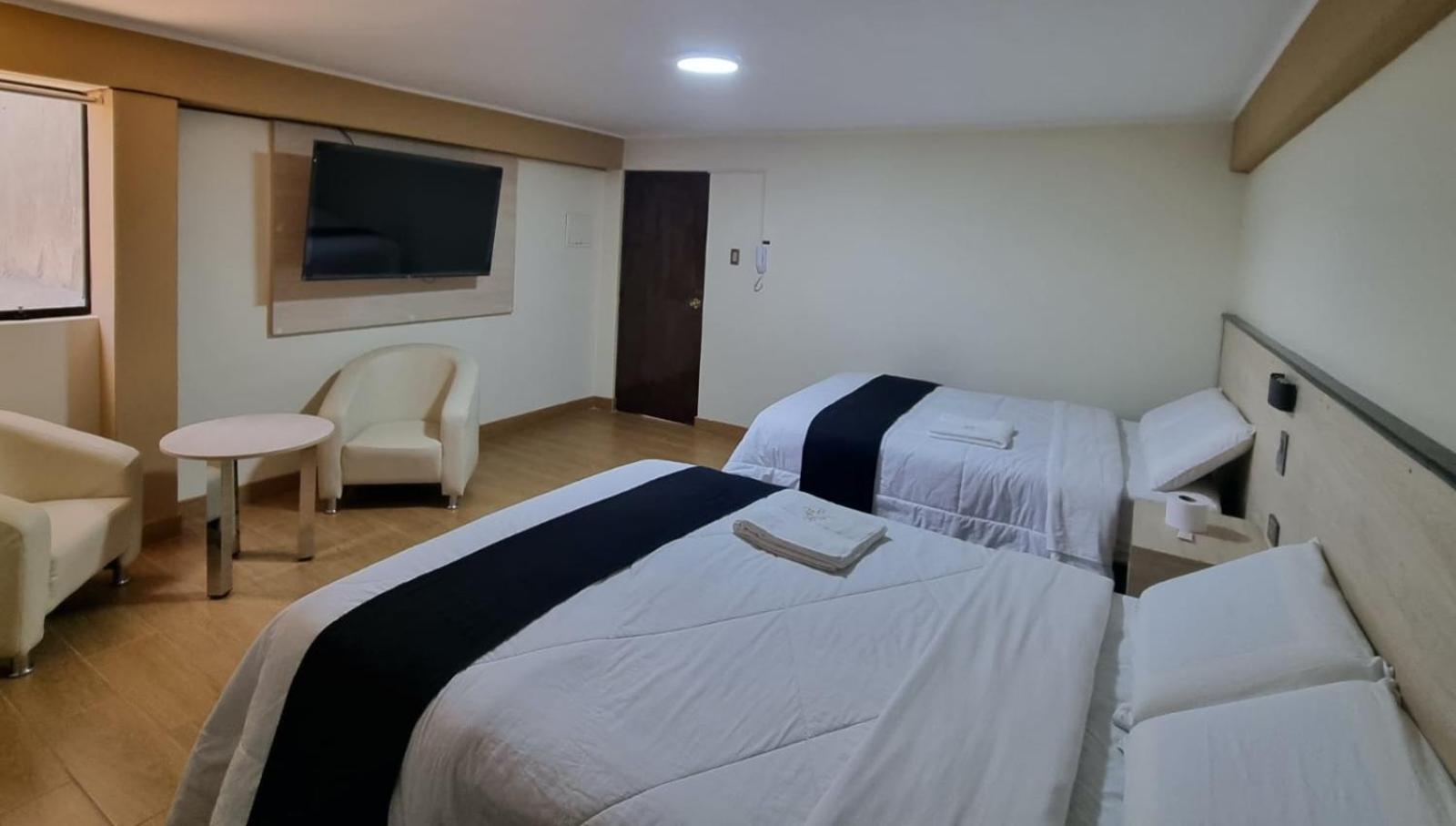 Deluxe Queen Room with Two Queen Beds photo 2