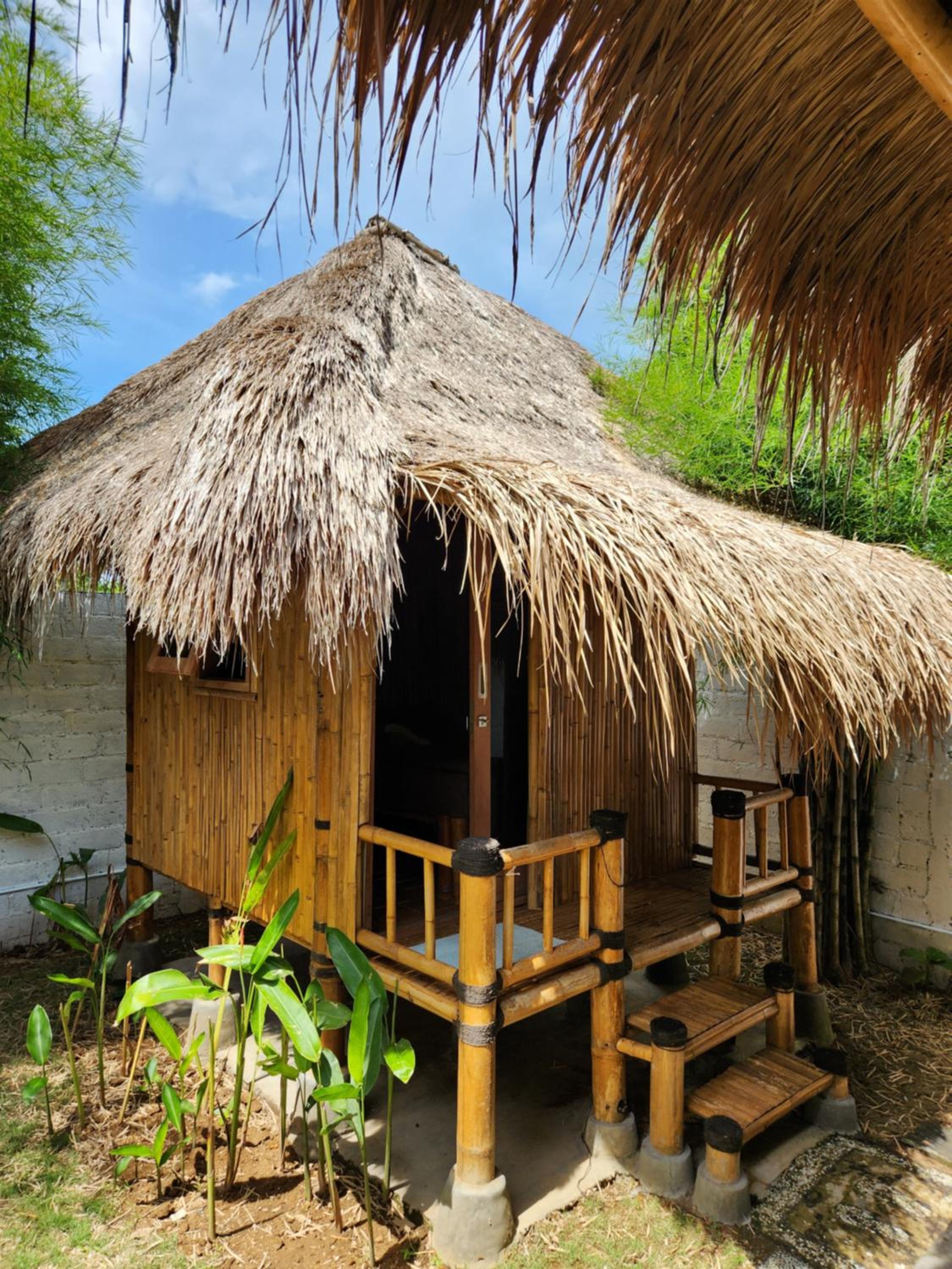 Bamboo Hut with Shared Bathroom photo 3