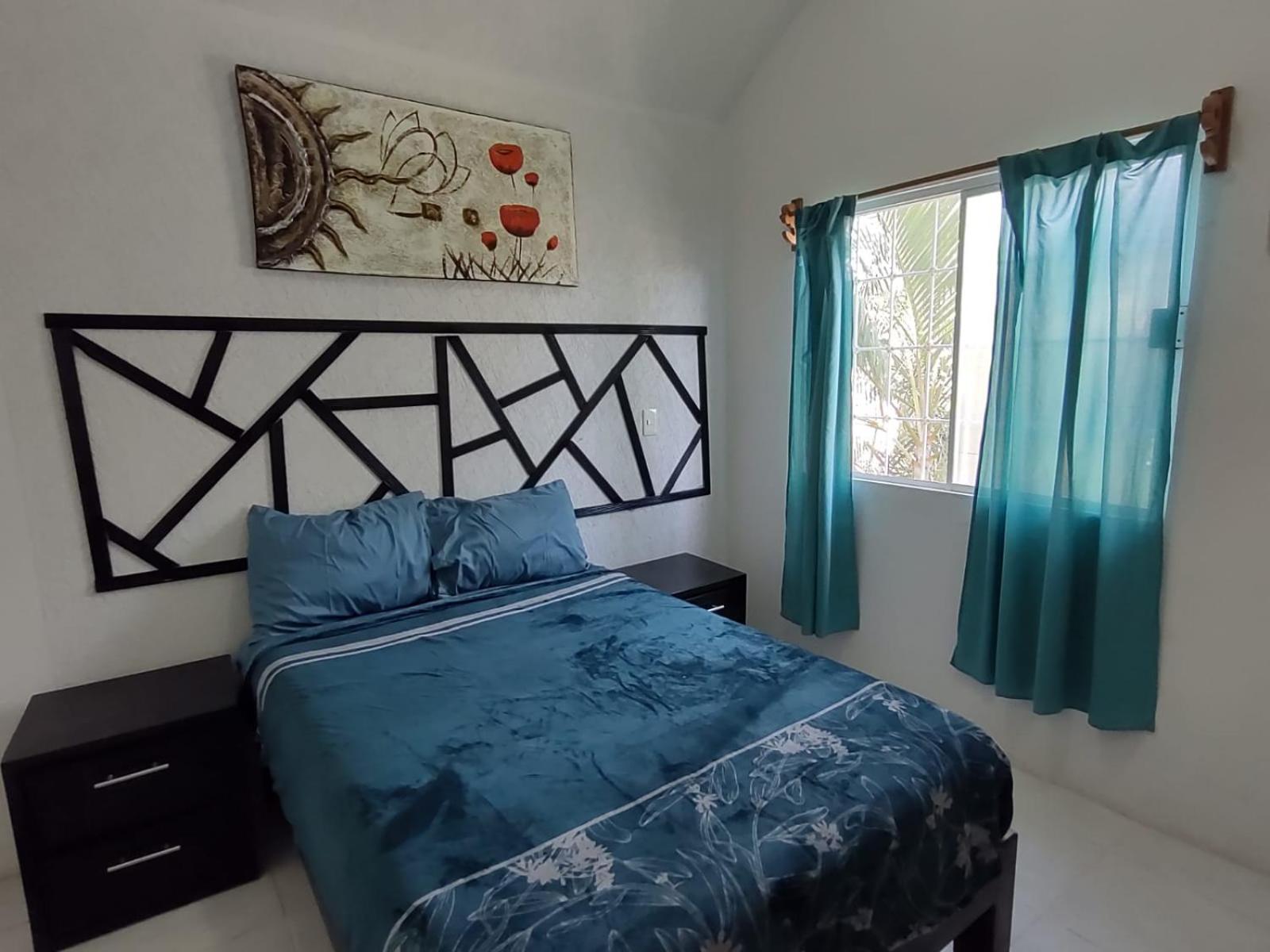 Three-Bedroom House - Photo 22