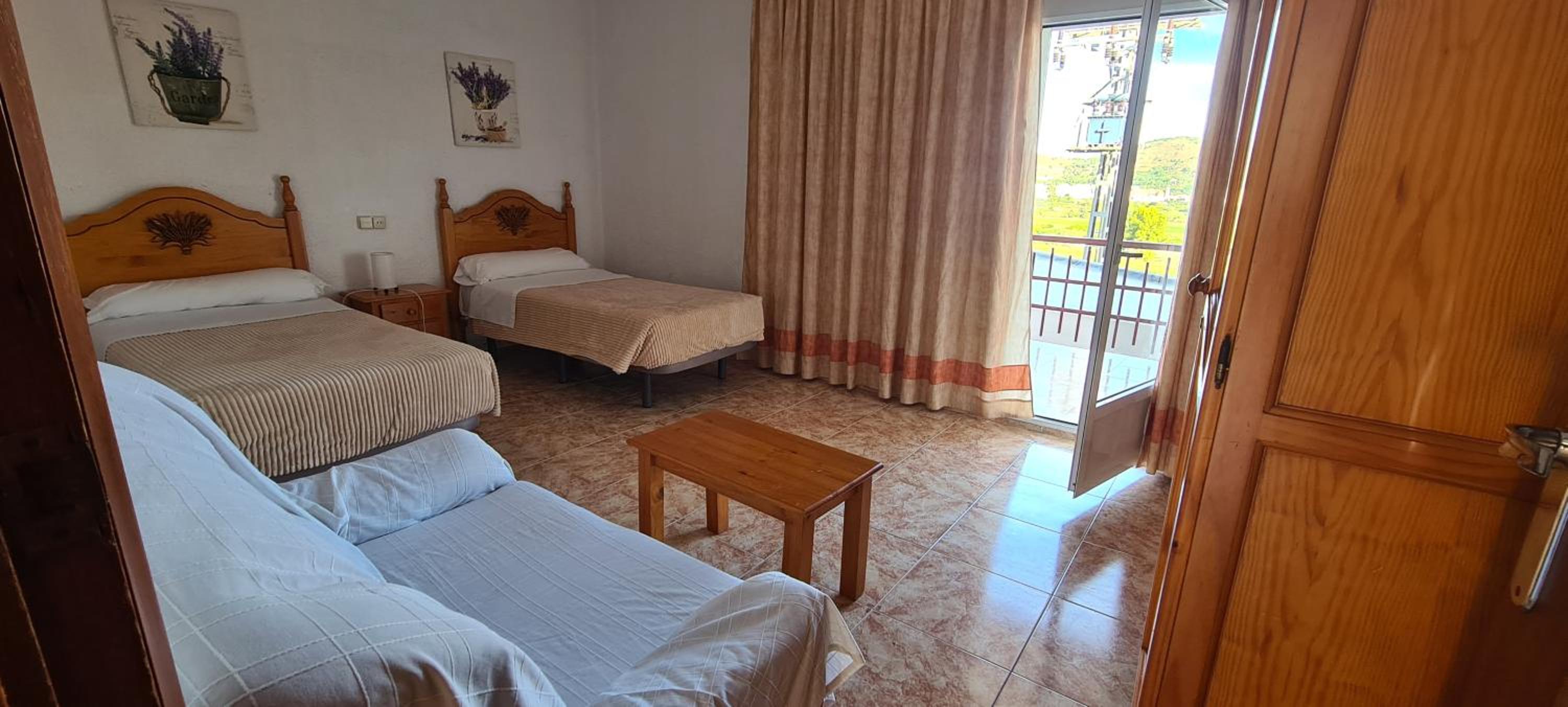 Habitación Cuádruple con Balcón