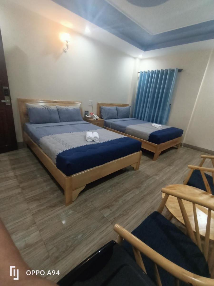 Deluxe Queen Room with Two Queen Beds photo 2