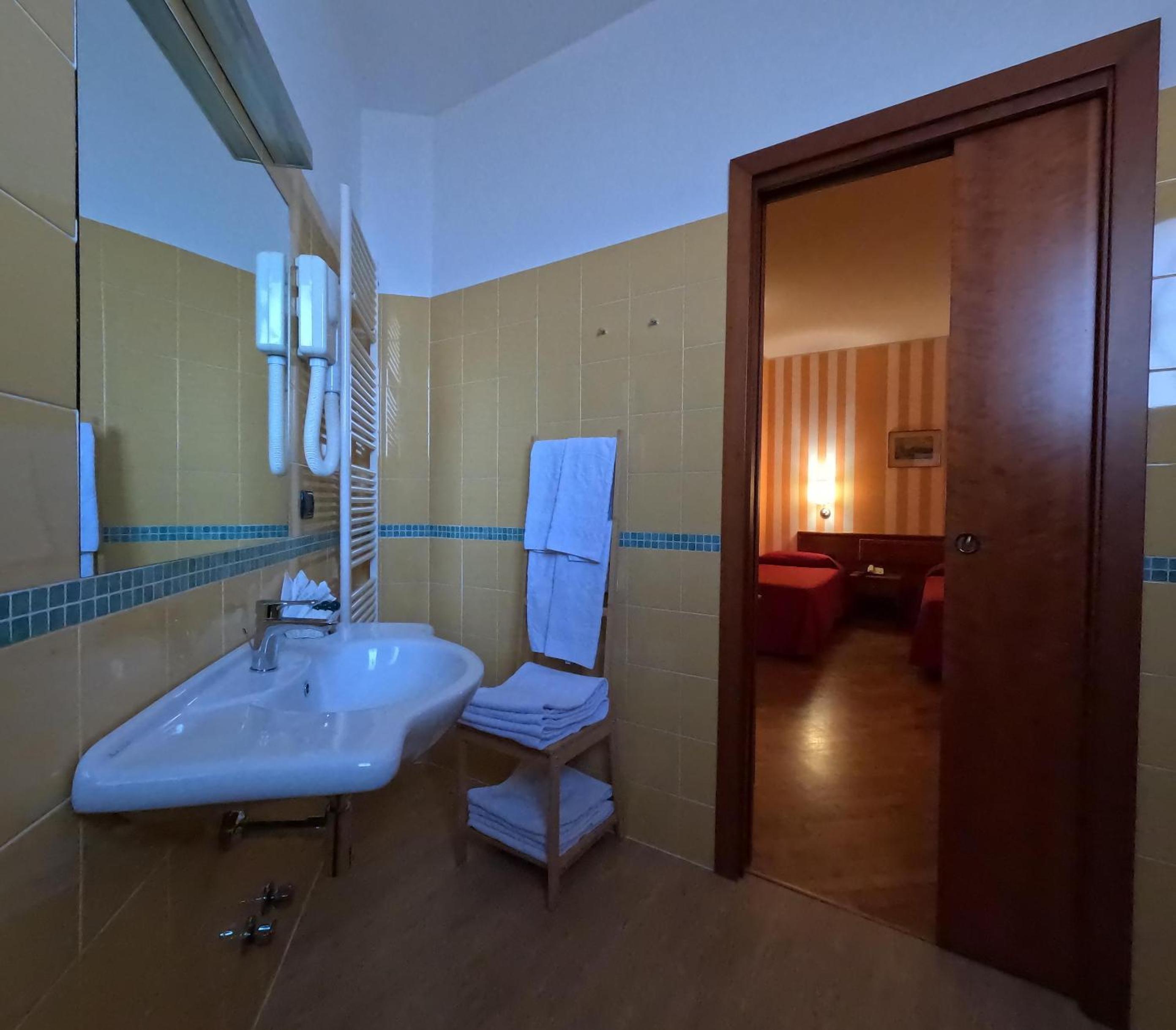 Quadruple Room with Private Bathroom