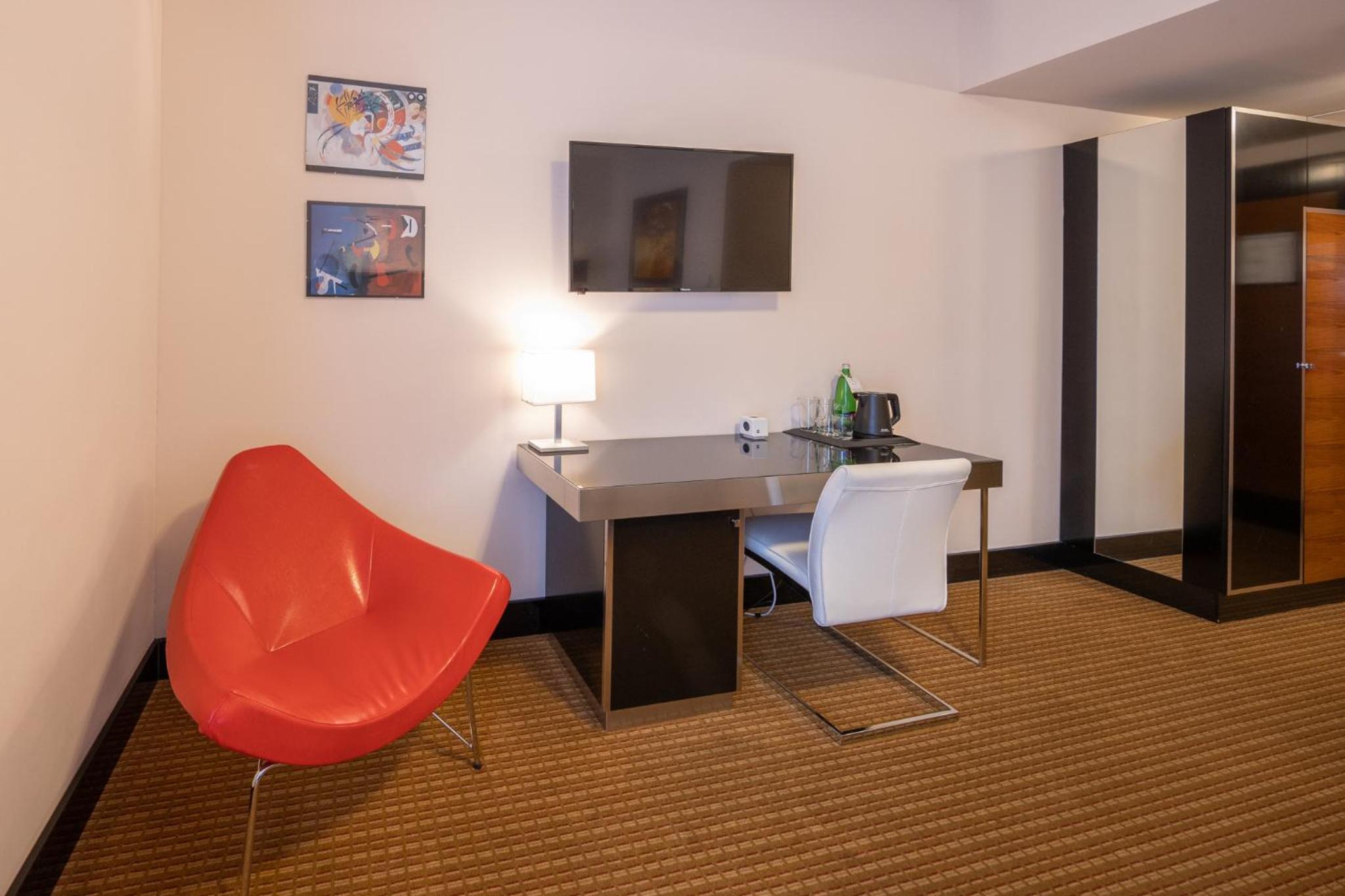 Relax in your stylish and modern hotel room.