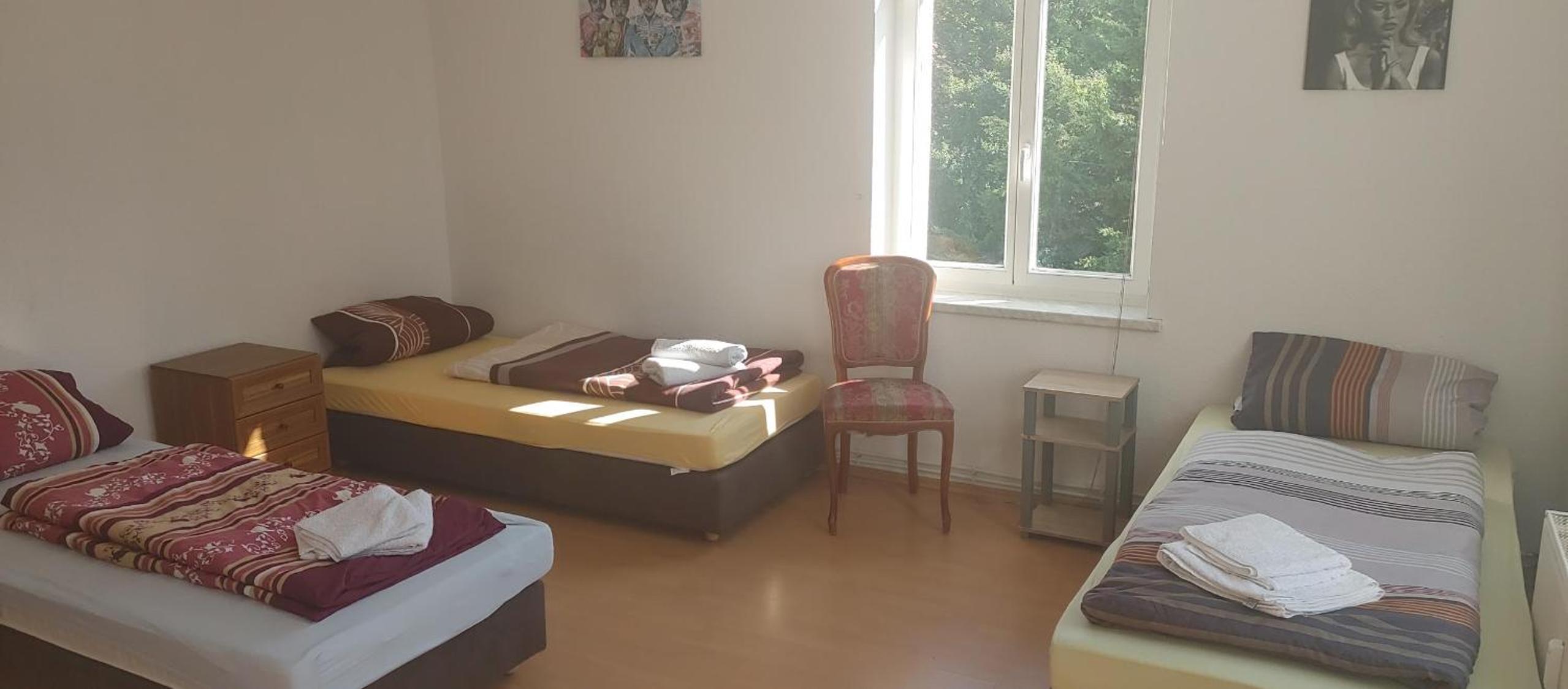 Basic Triple Room with Shared Bathroom photo 1