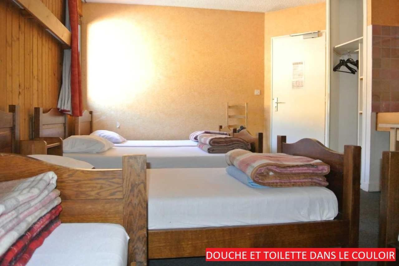 Quadruple Room with Shared Bathroom