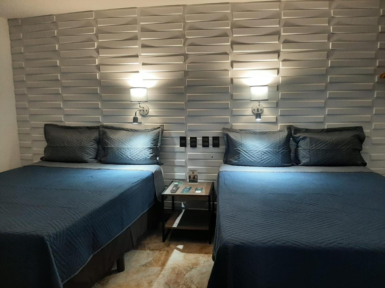 Queen Room with Two Queen Beds - Photo 5