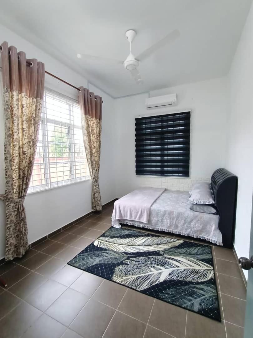 Three-Bedroom House photo 1
