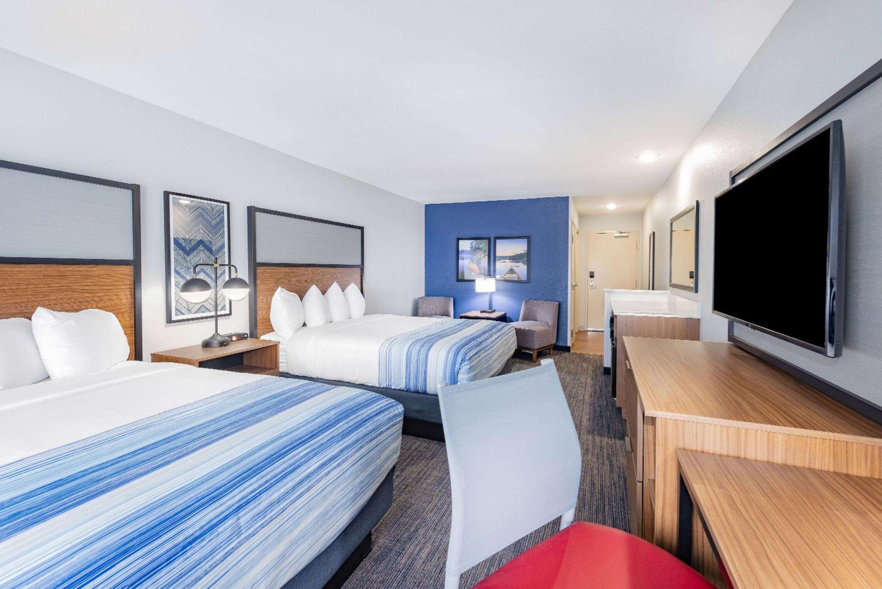 Deluxe Queen Room with Two Queen Beds - Non-Smoking photo 1