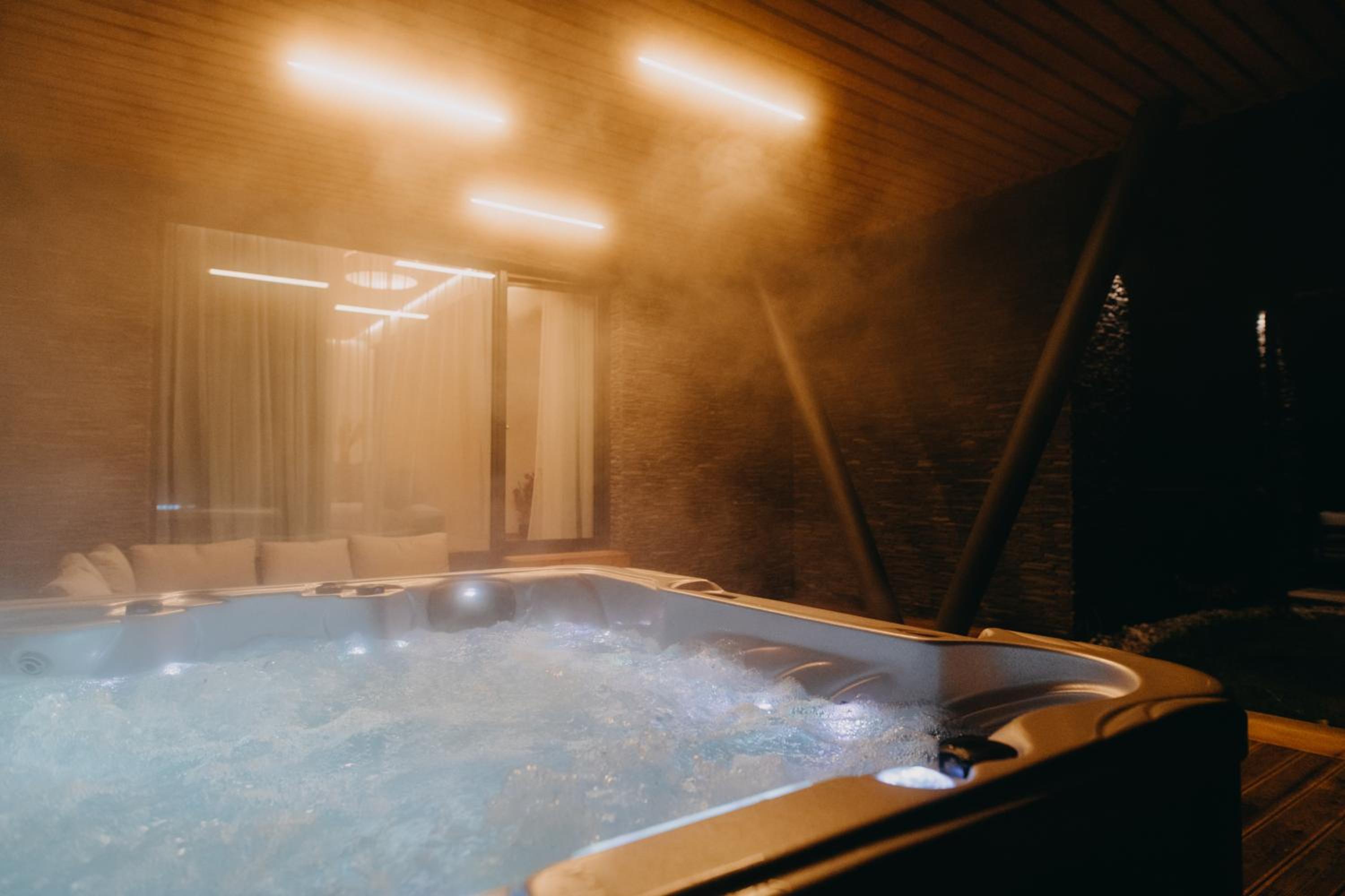 Four-Bedroom Chalet with Jacuzzi - Photo 25