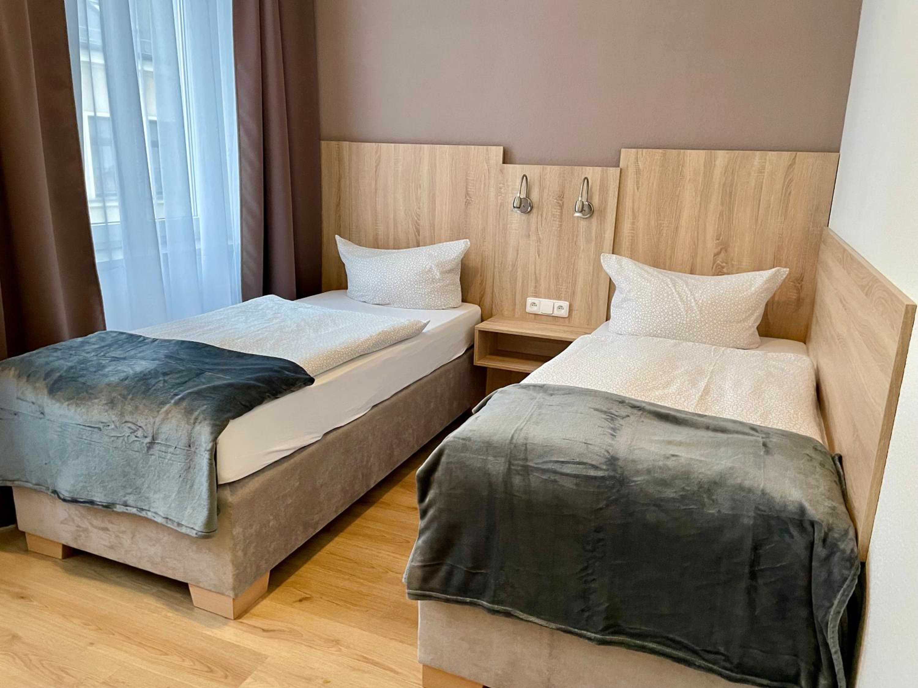 Twin Room - Photo 1