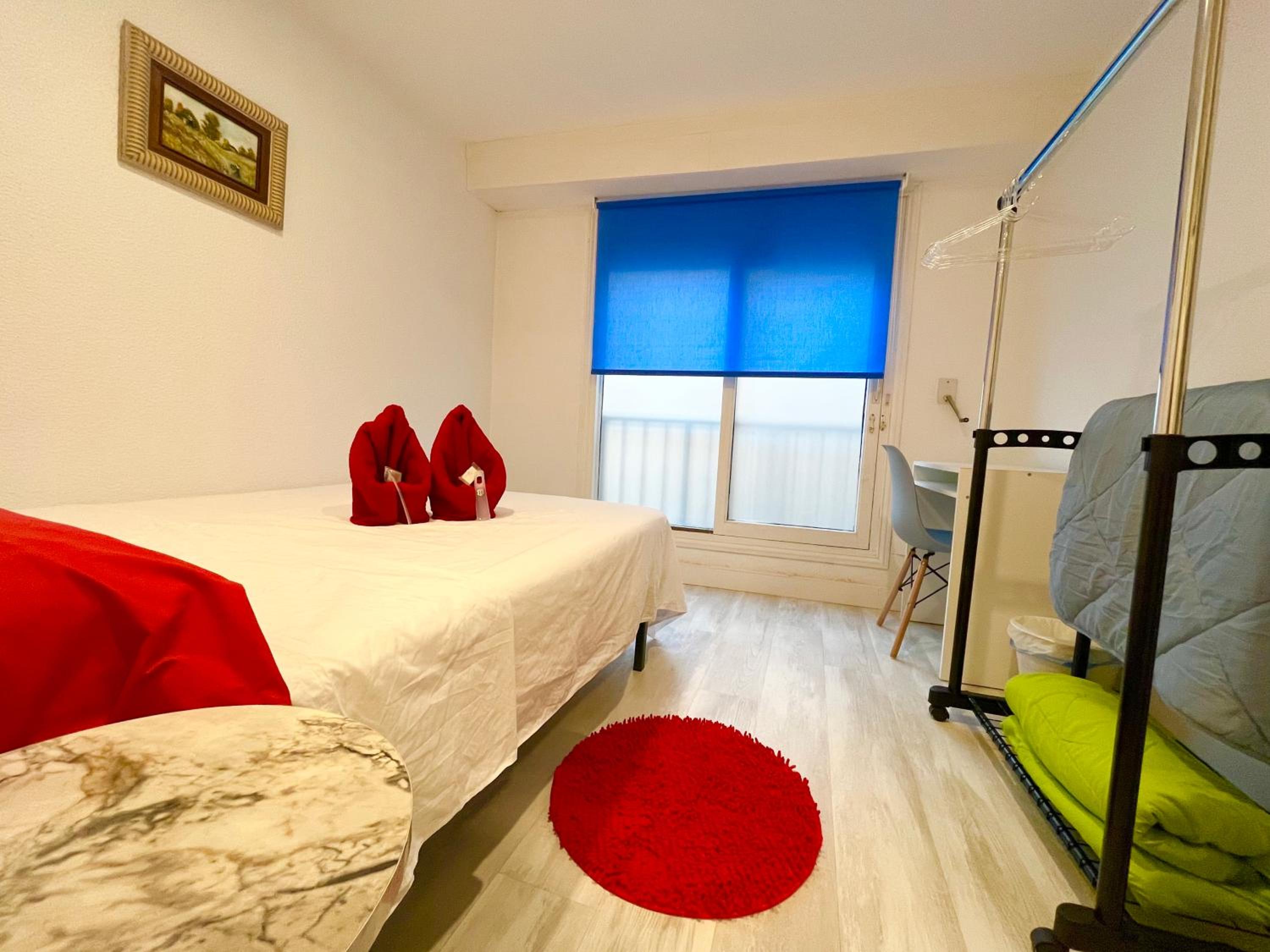 Habitación individual con baño compartido