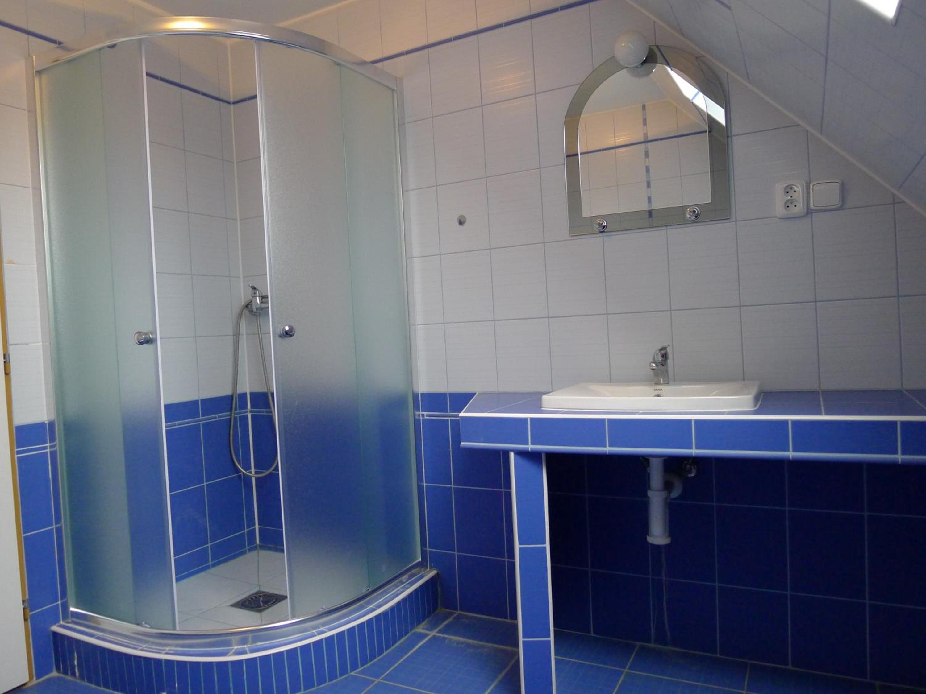 Three-Bedroom Apartment - Photo 18
