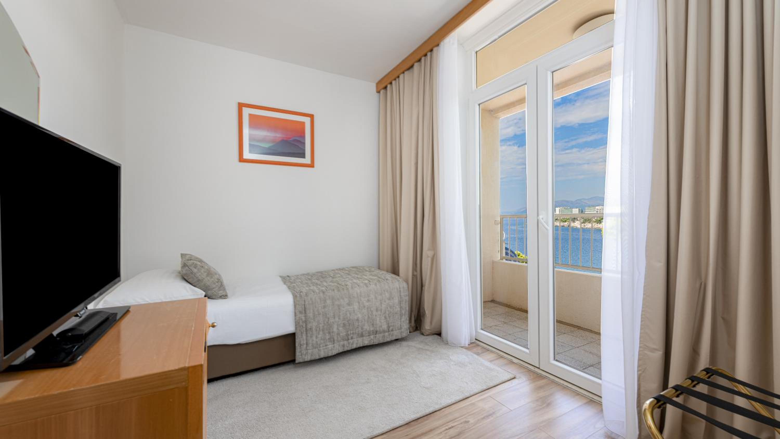 Triple Room with Balcony and Sea View