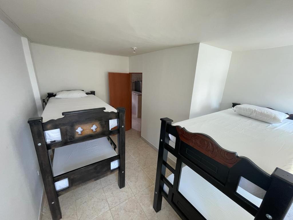 Economy Quadruple Room With Shared Bathroom photo 3