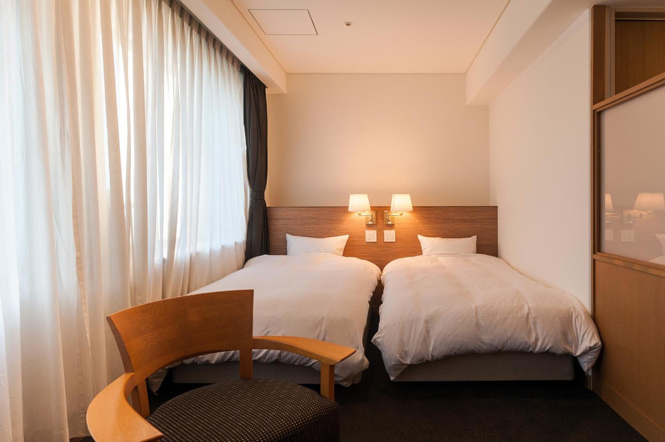 Twin Room - Non-Smoking photo 1