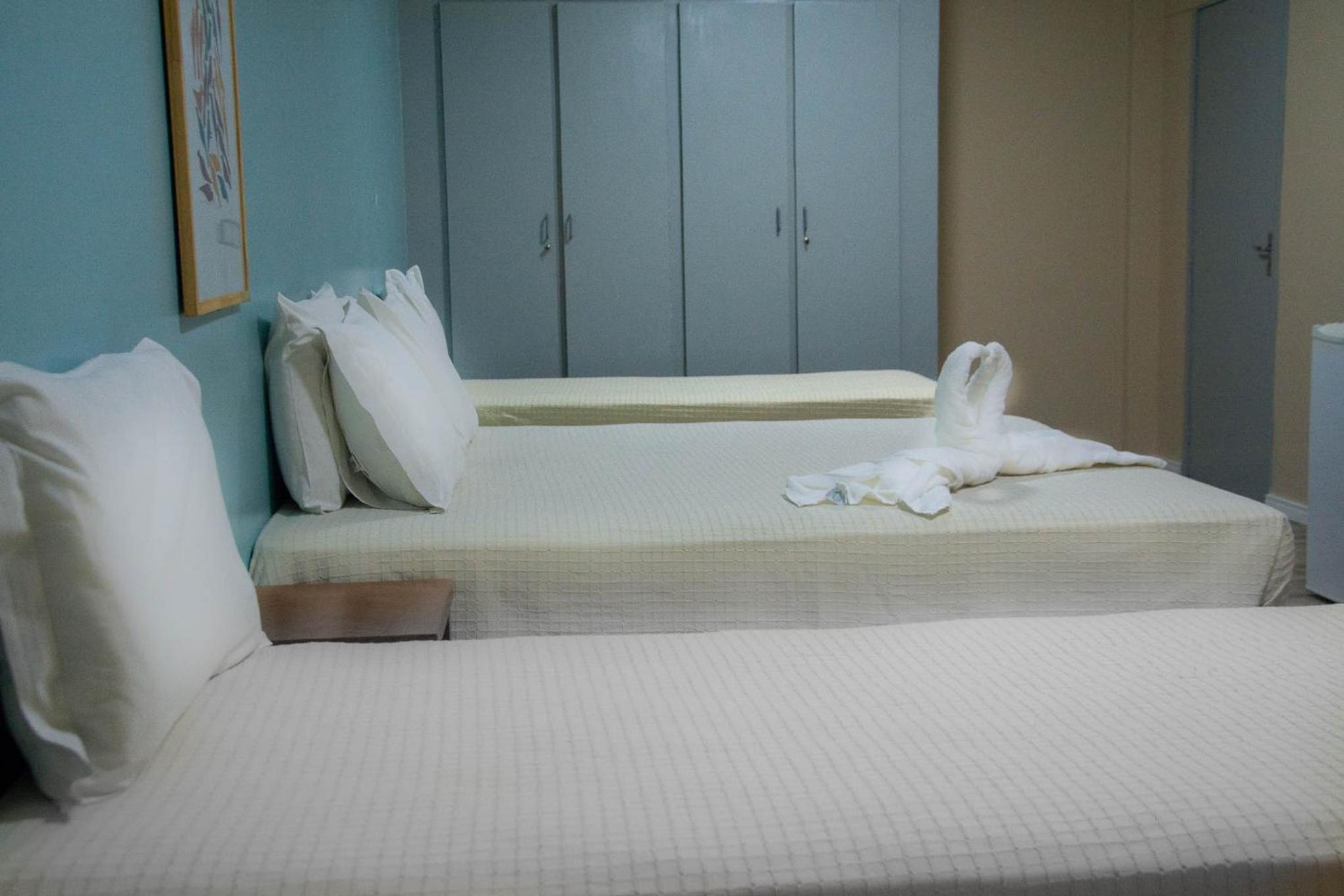 Quadruple Room with four single beds