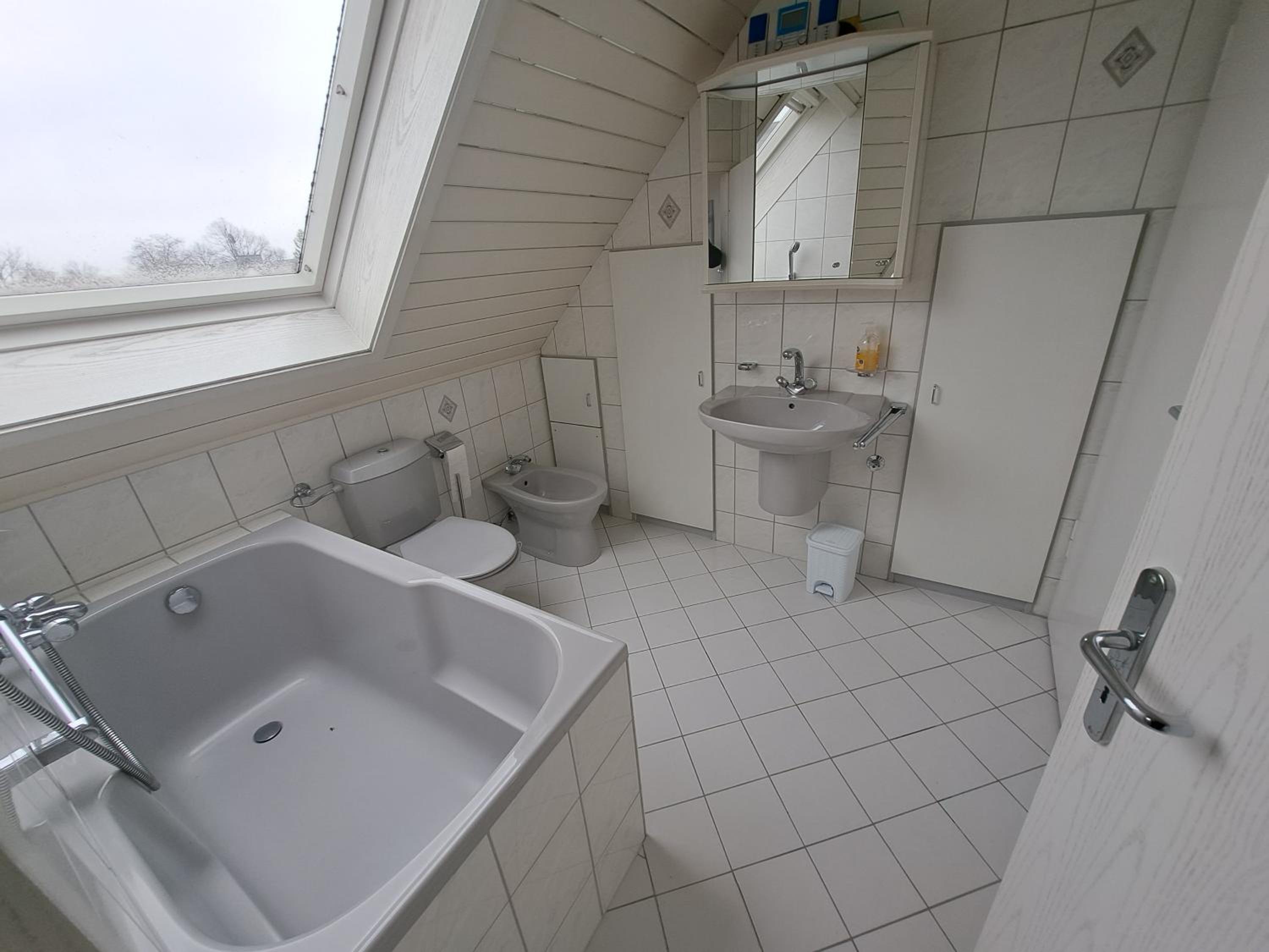 Three-Bedroom House - Photo 17