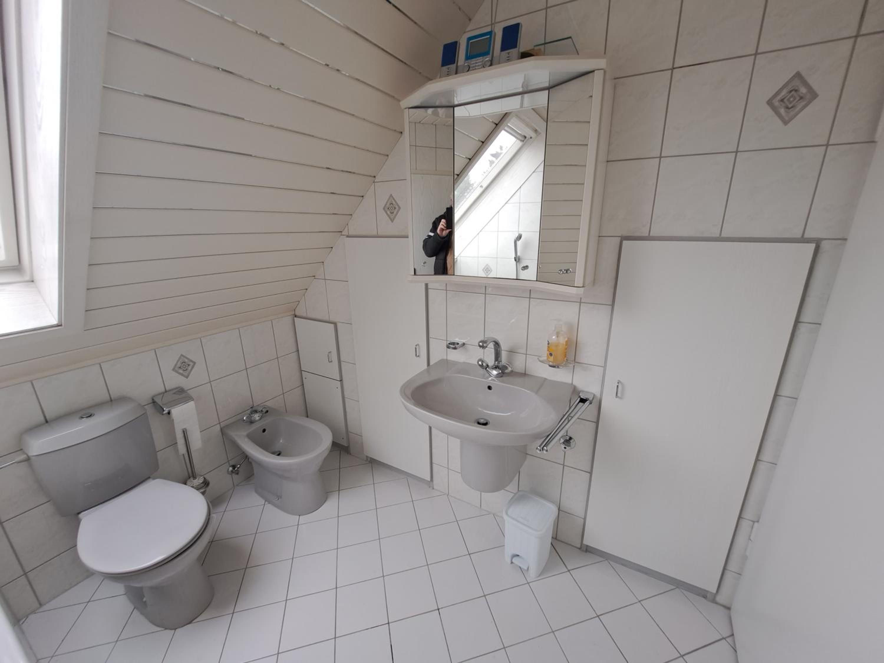 Three-Bedroom House - Photo 16