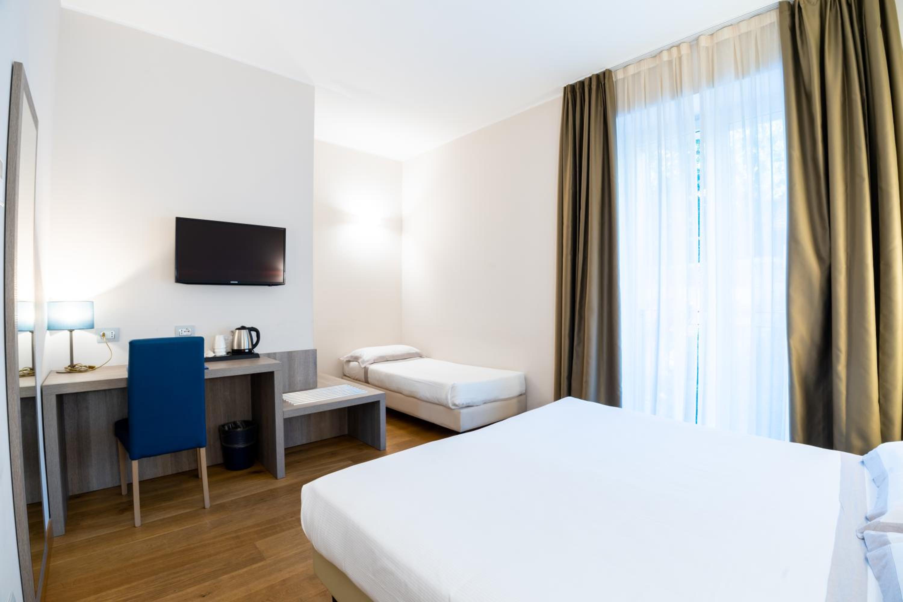 Deluxe Triple Room - Photo 1