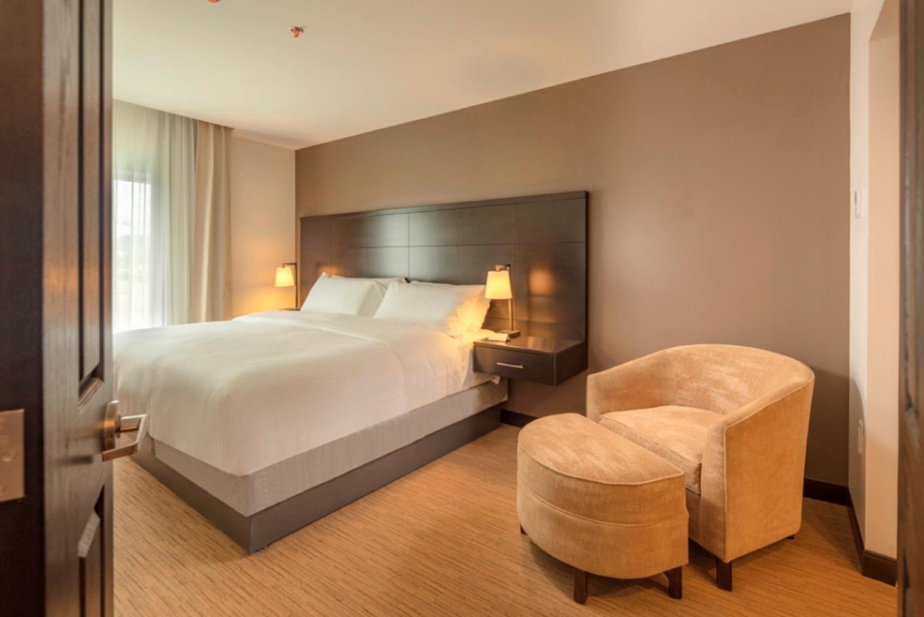 Two Bedroom Suite with One Queen Bed and Two Double Beds - Non-Smoking