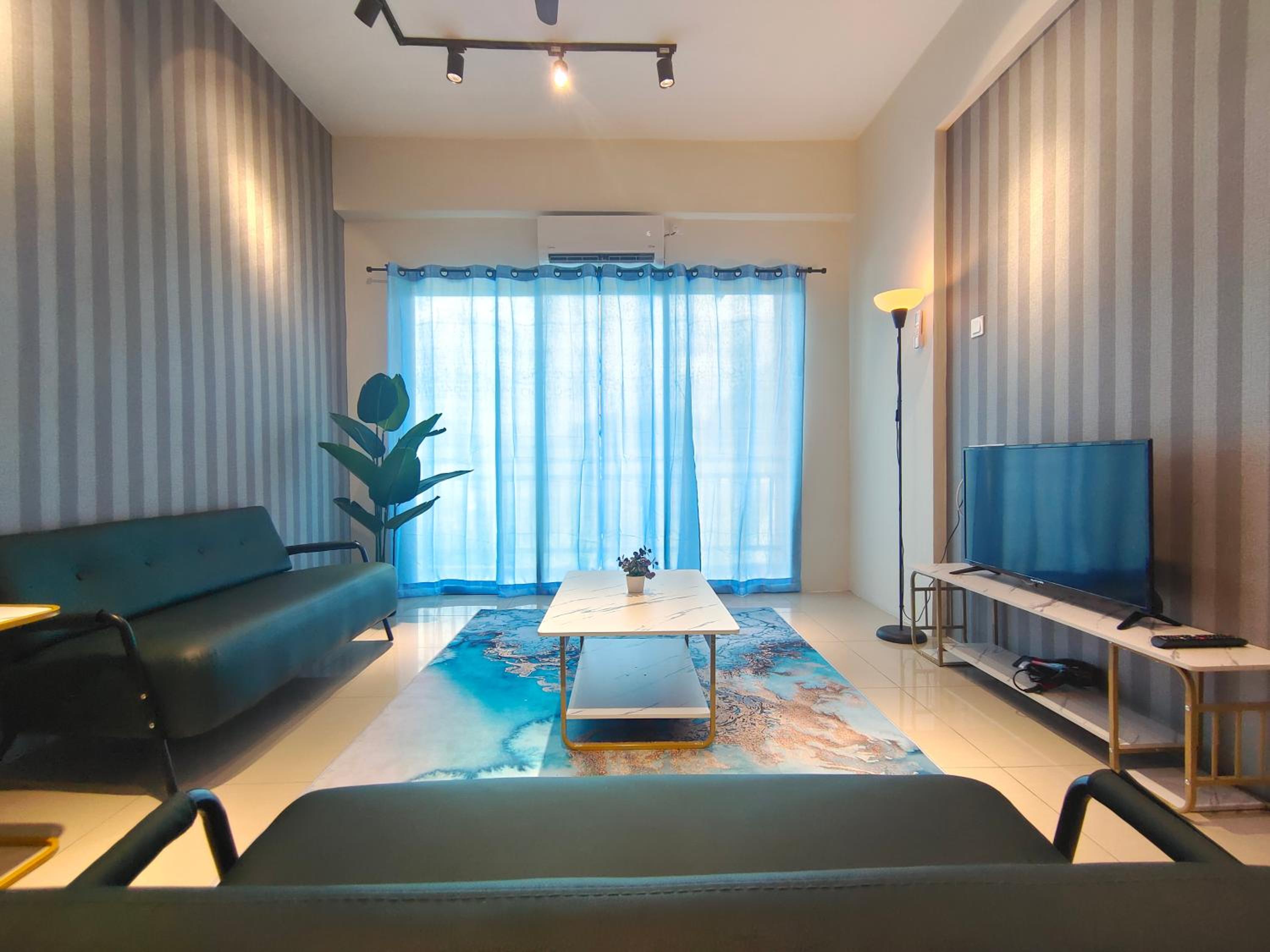 Three-Bedroom Apartment - Photo 18