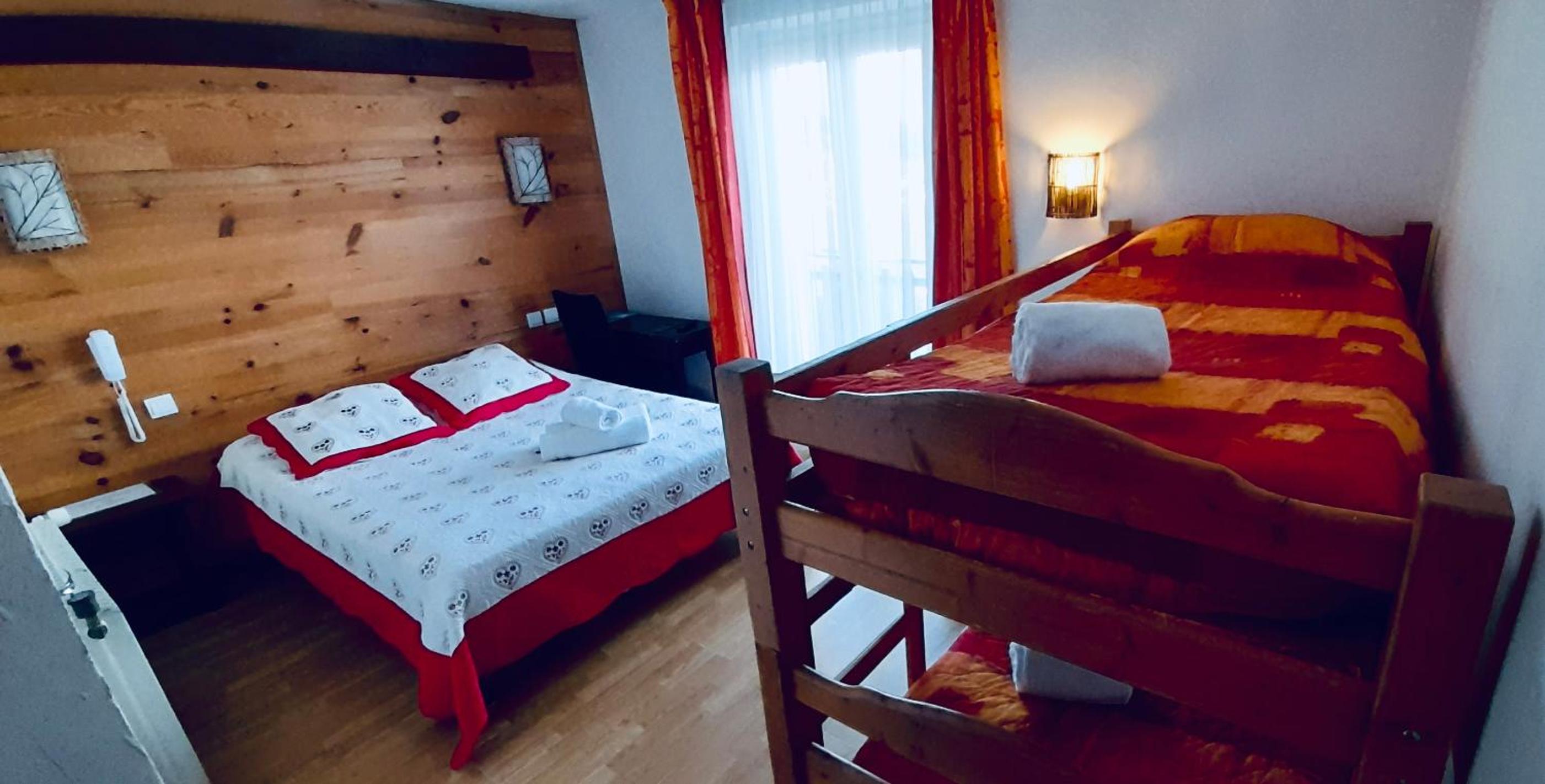 Quadruple Room (2 Adults + 2 Children)