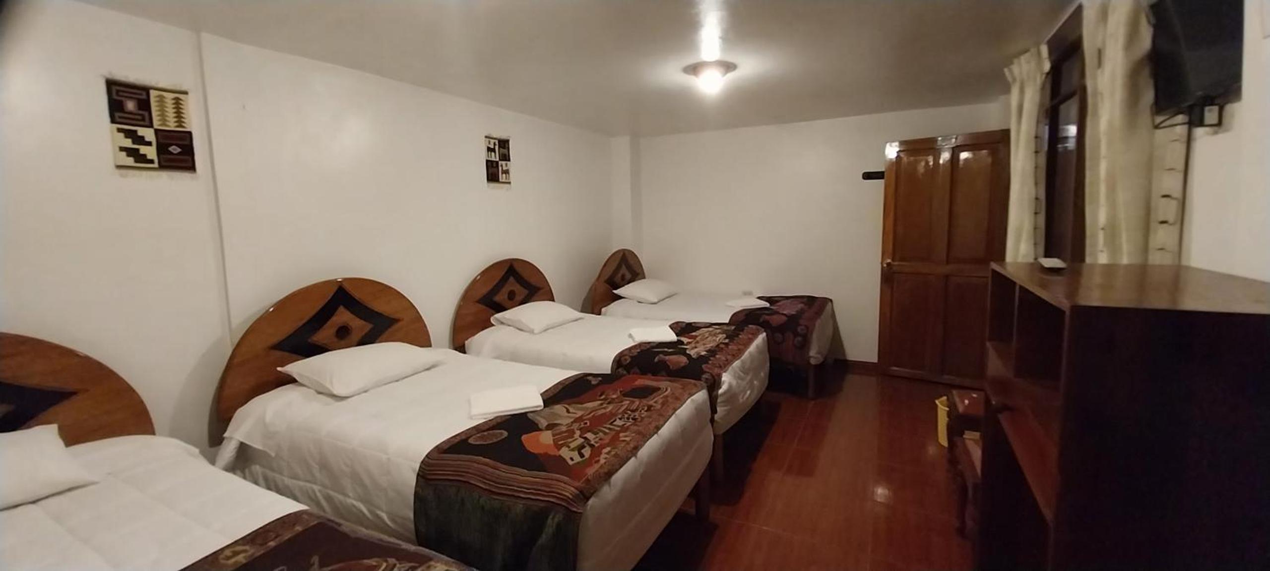 Quadruple Room with Private Bathroom photo 3