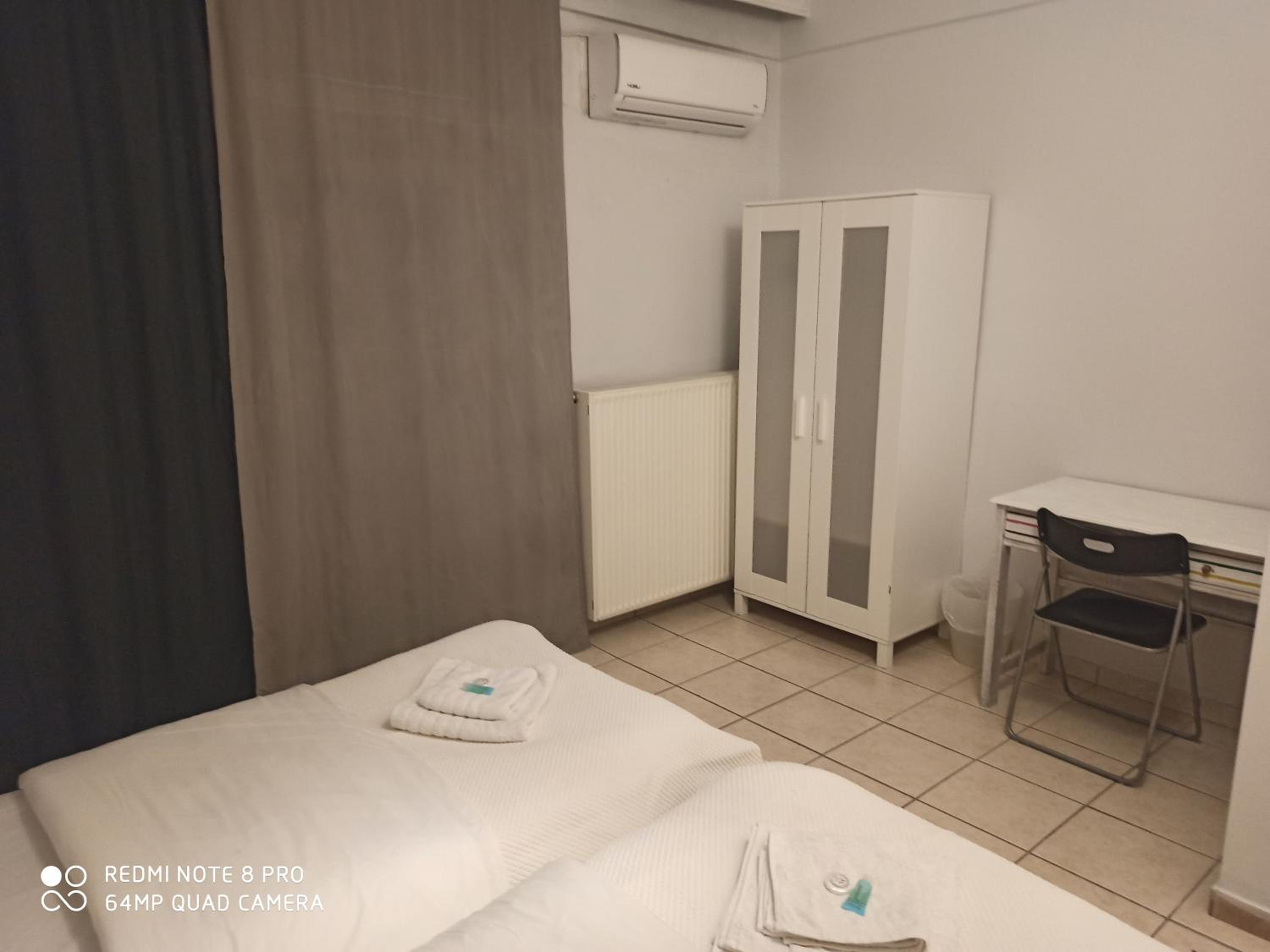Three-Bedroom Apartment - Photo 2