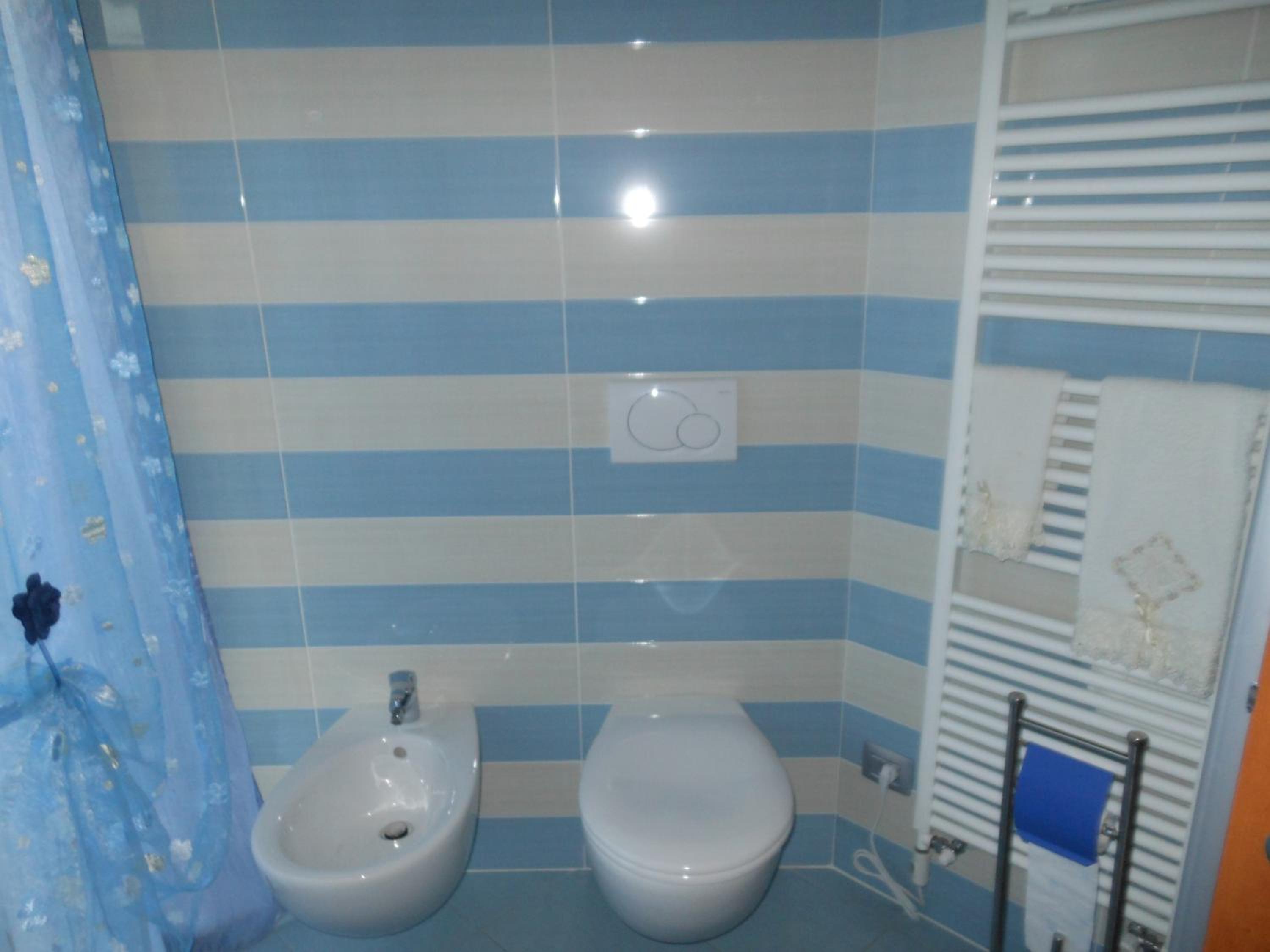 Quadruple Room - Photo 13