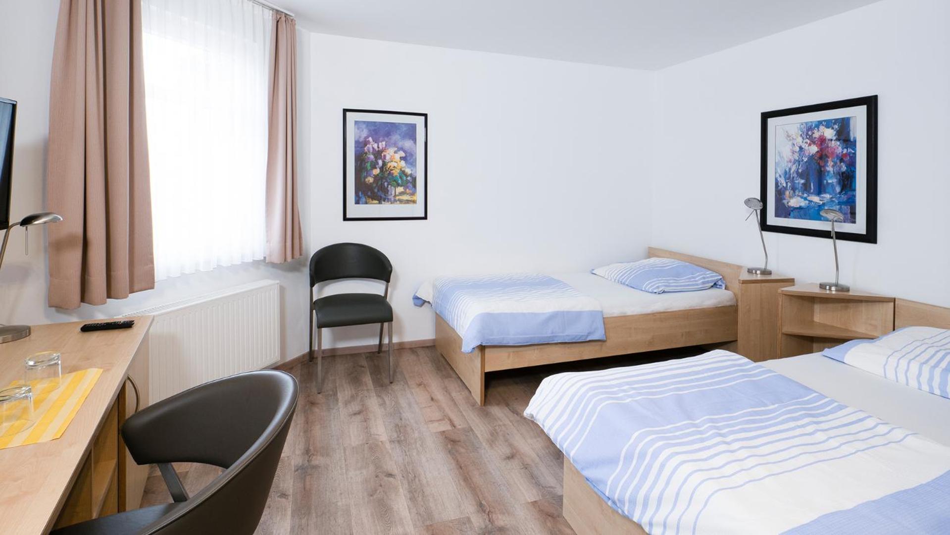 Twin Room - Photo 1