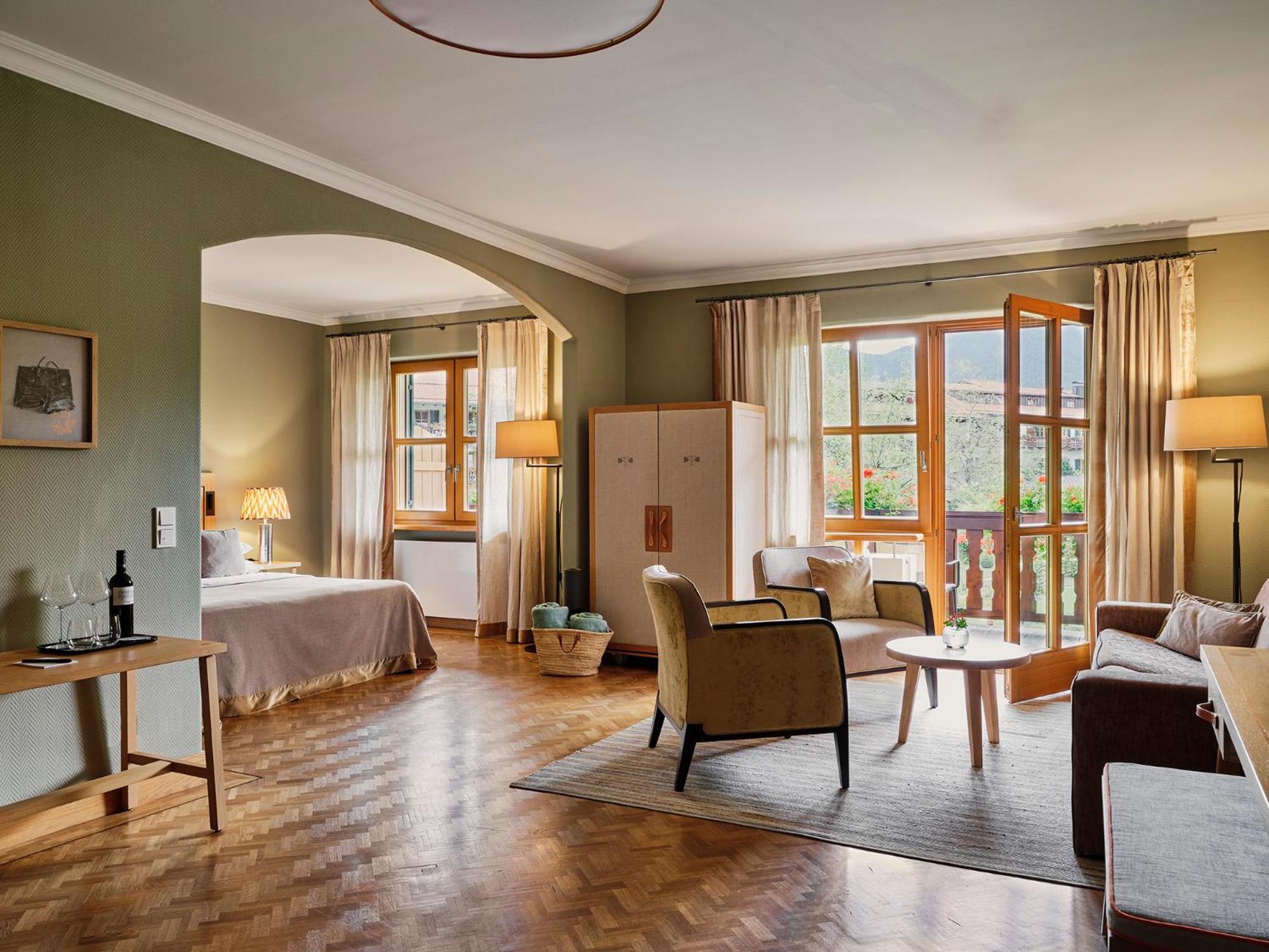 Junior Suite with Balcony and Garden View