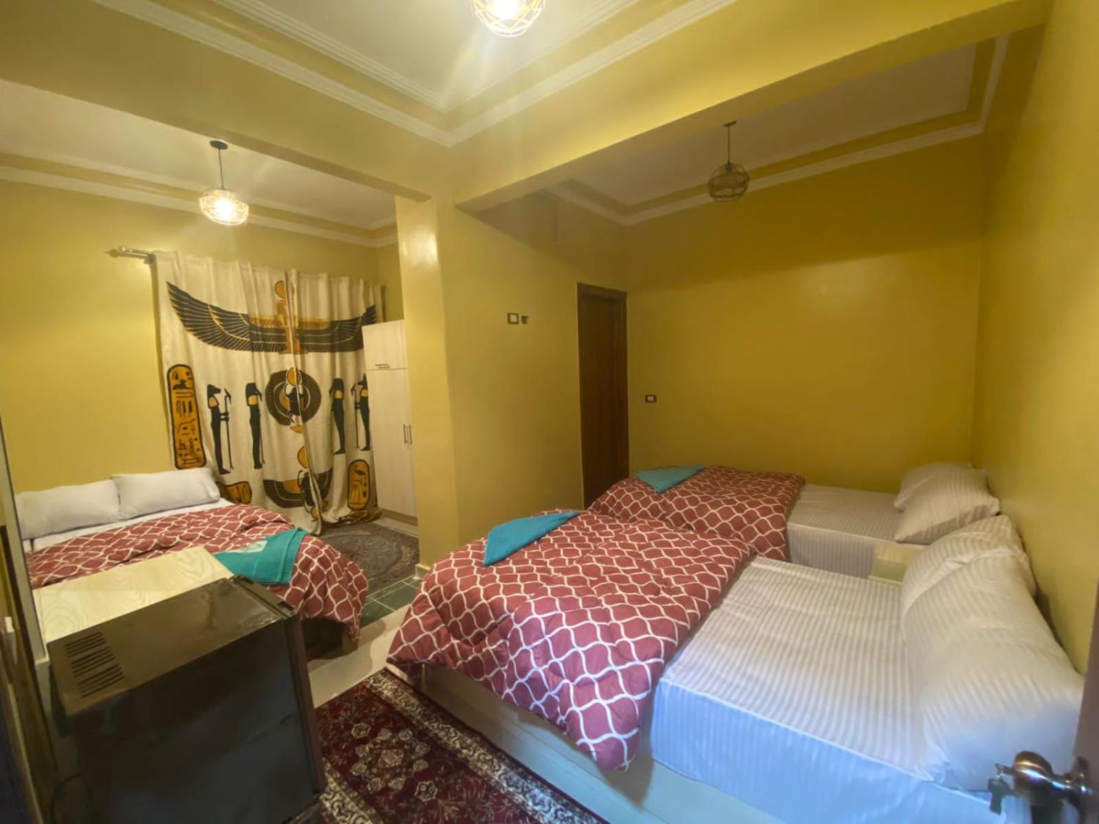 Economy Triple Room - Photo 7