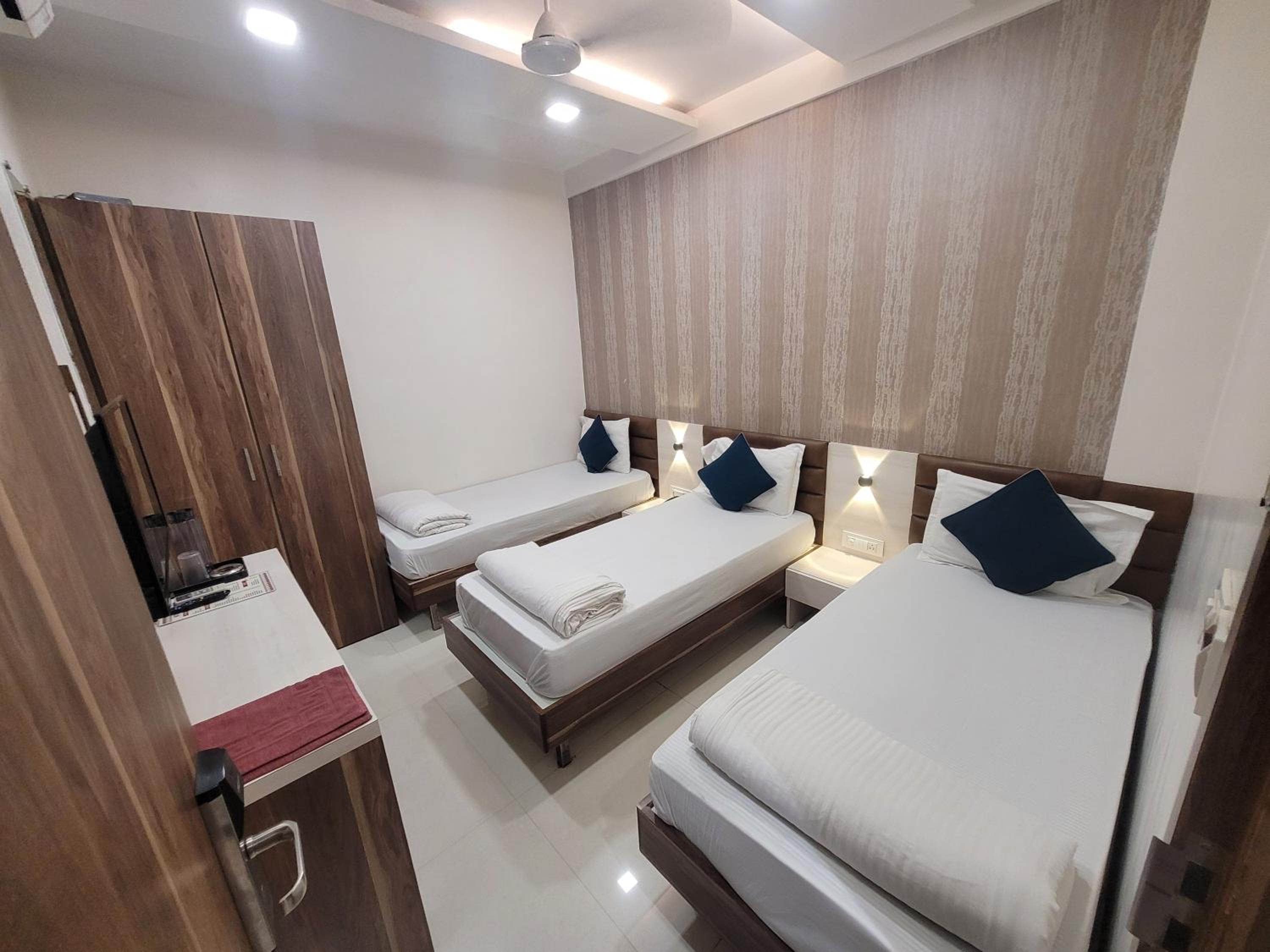 Deluxe Triple Room - Photo 1