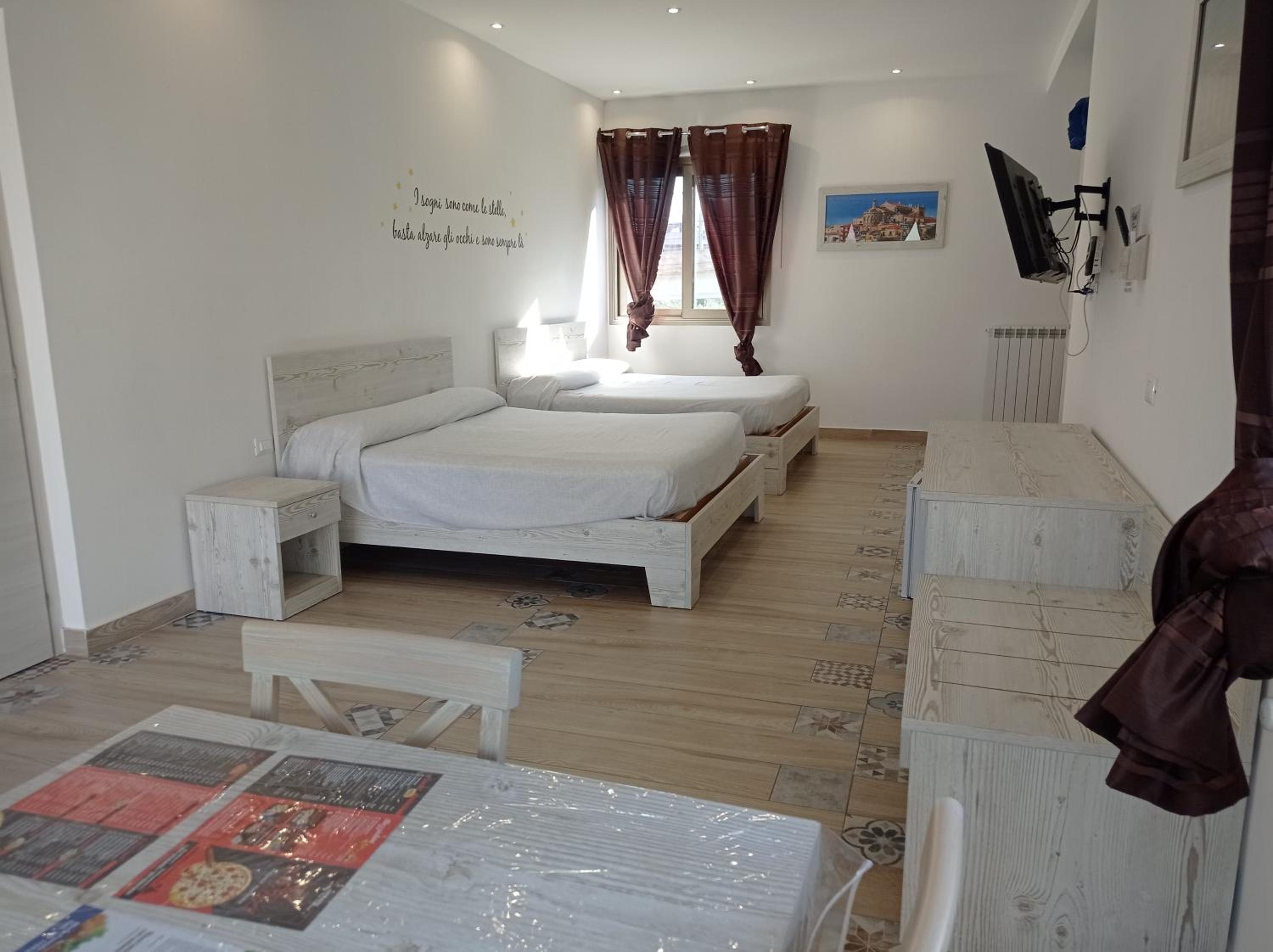 Quadruple Room - Photo 1