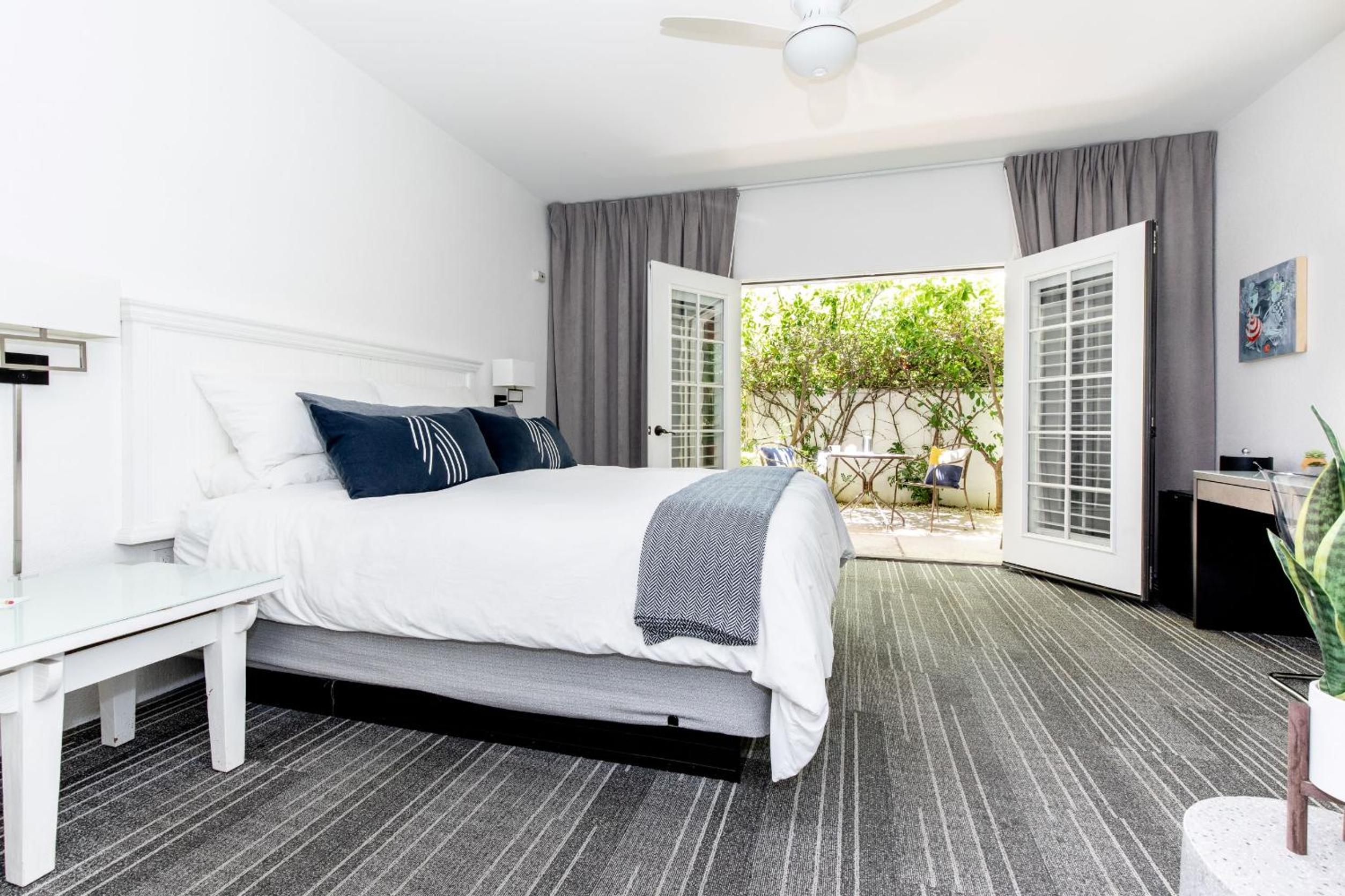 Deluxe King Room with Patio and Fireplace - Photo 1