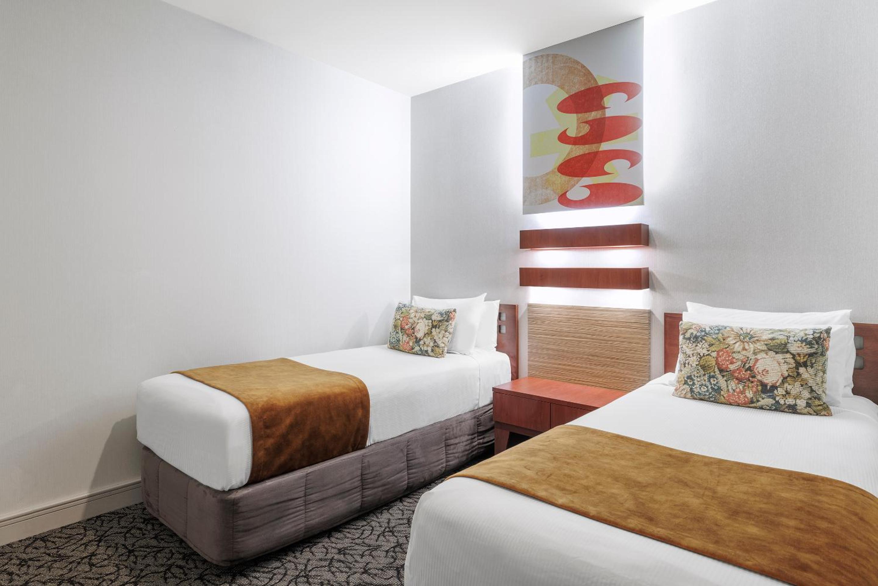 Executive Two-Bedroom Suite With One Queen And Two Single Beds - Photo 2