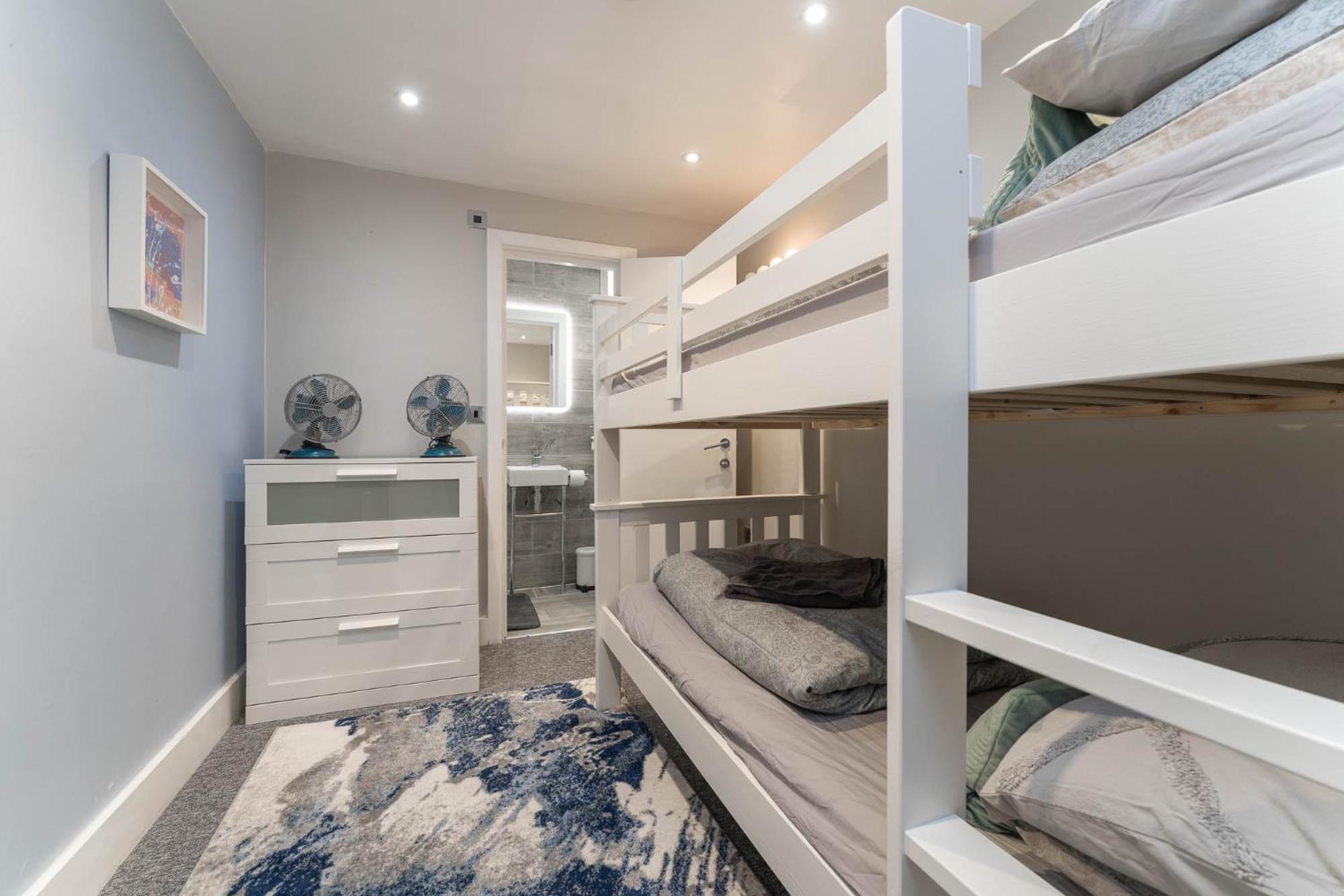 Three-Bedroom Apartment - Photo 11