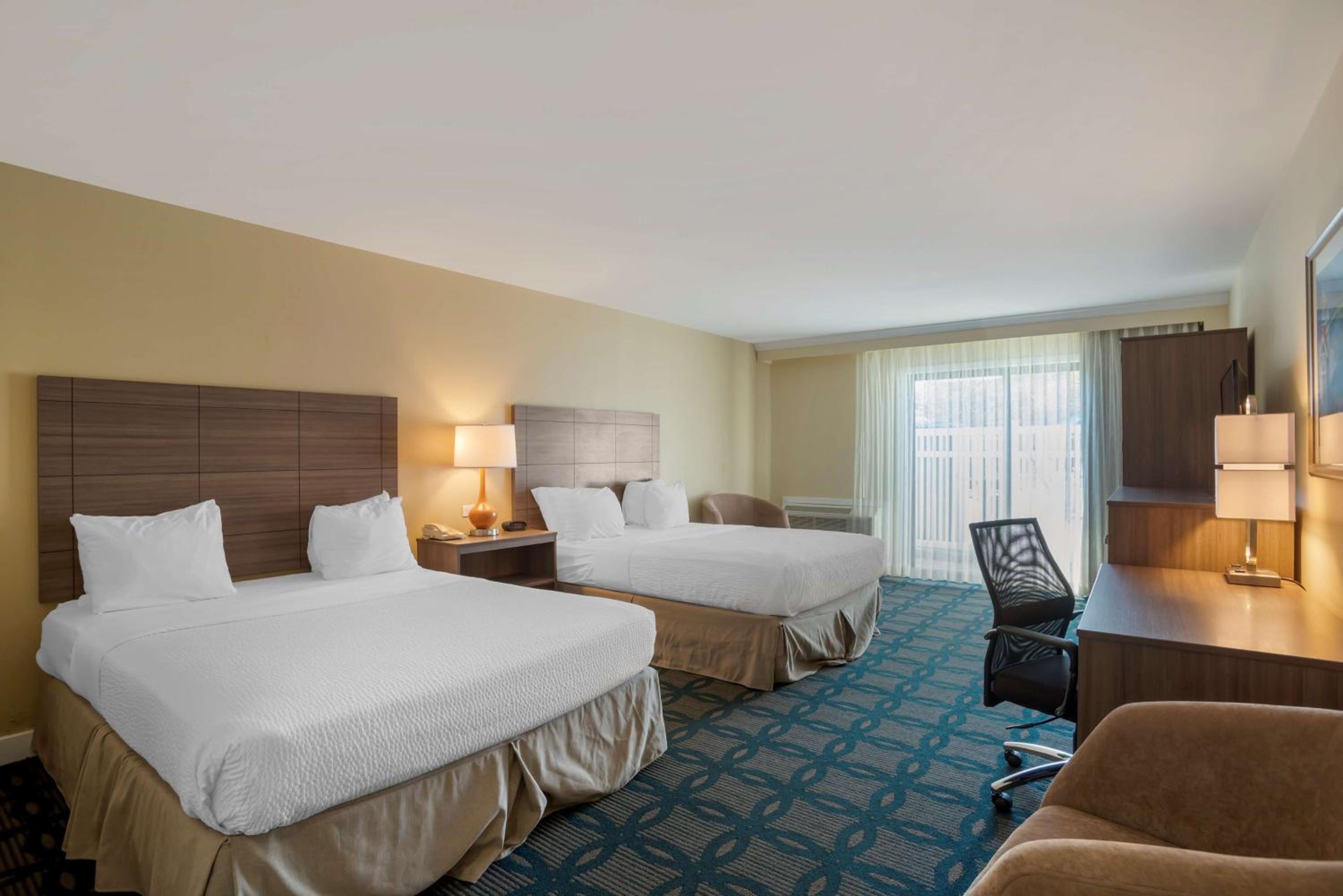King Room with Two King Beds, Balcony and Shower - Non-Smoking