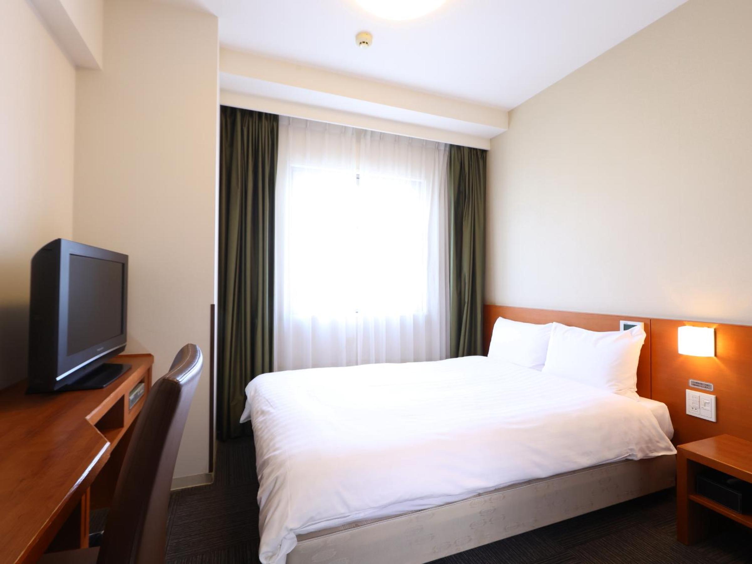 Double Room - Smoking - No Daily Cleaning