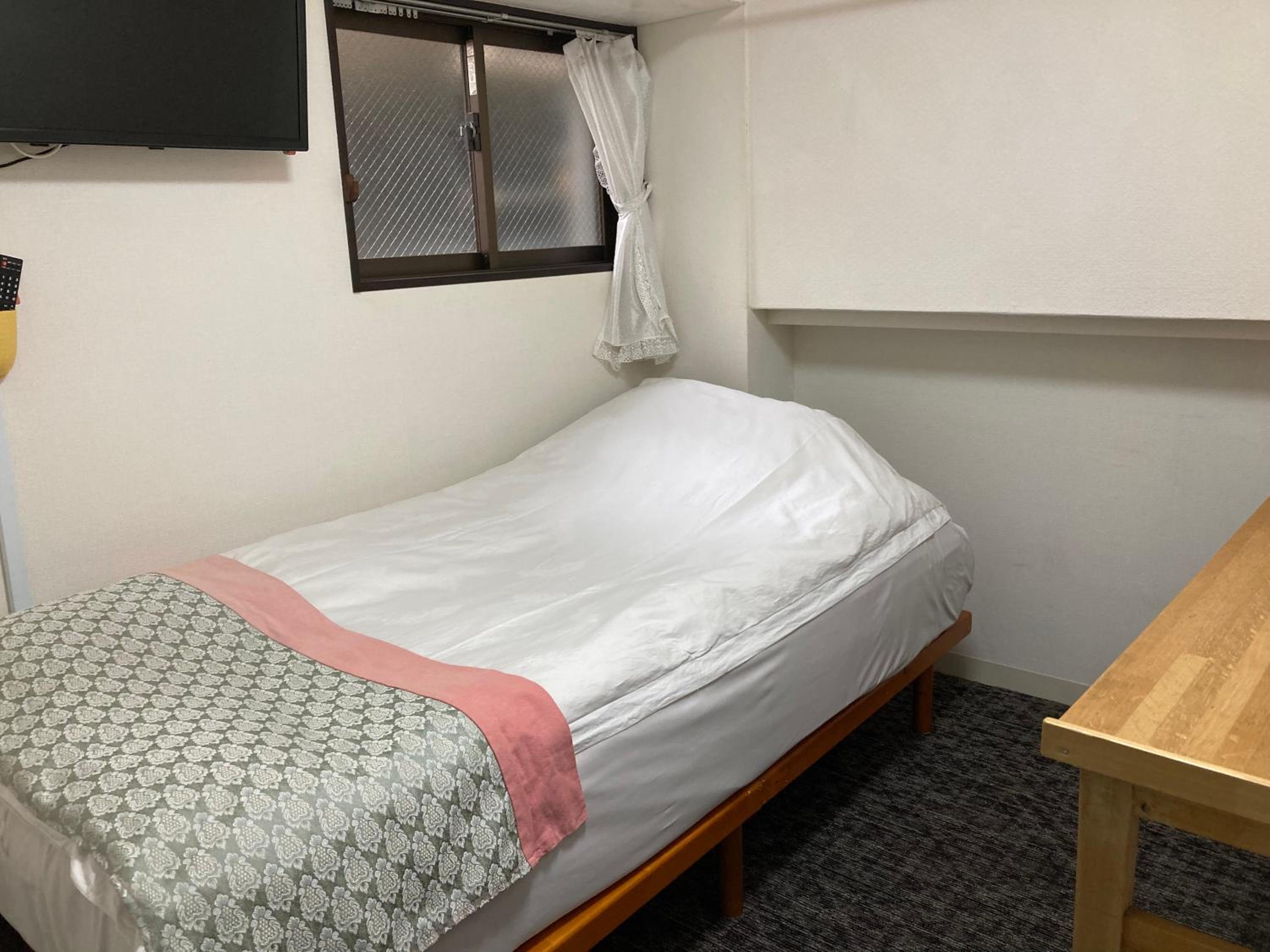 Single Room with Shared Shower and Toilet