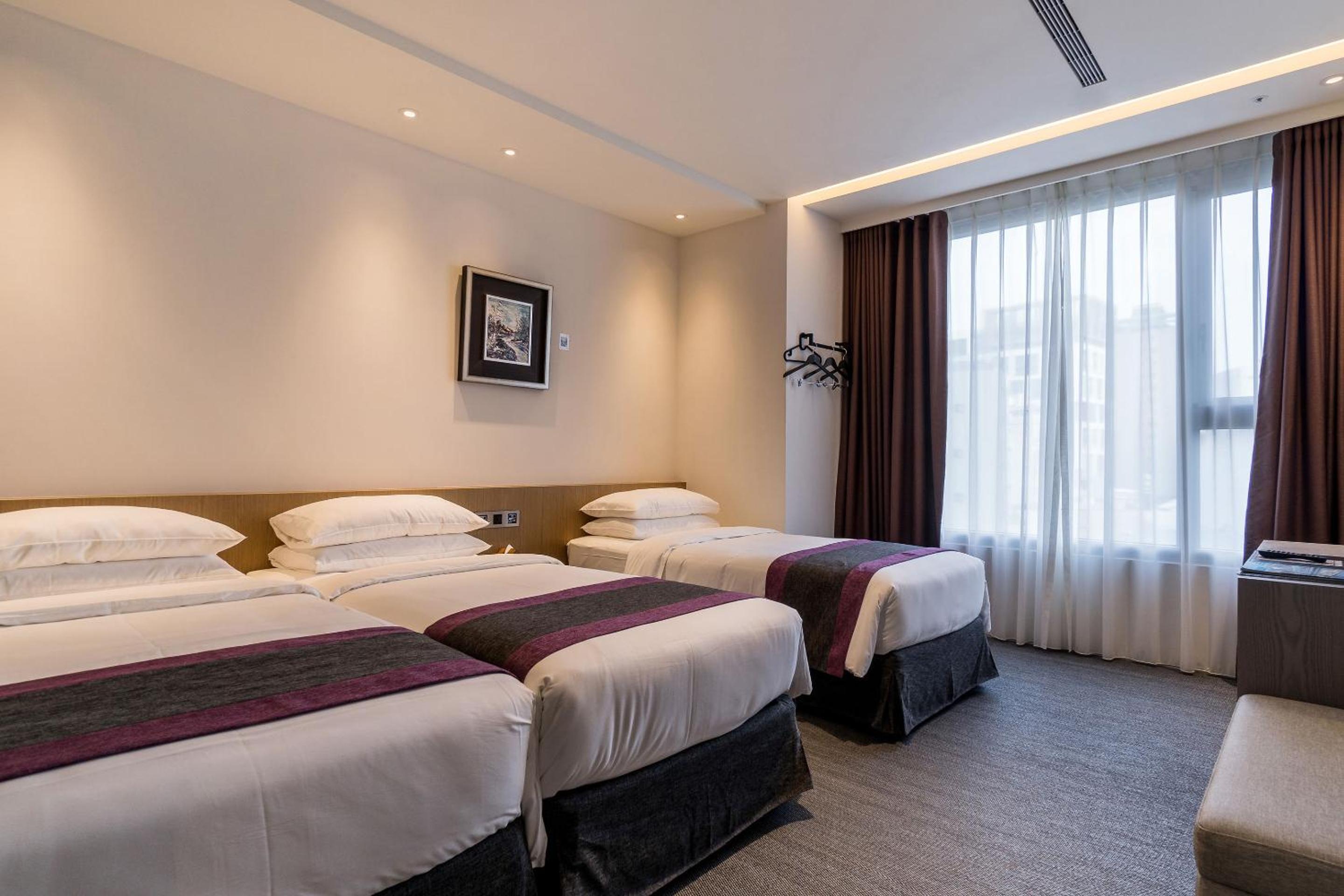 Deluxe Triple Room - Photo 6