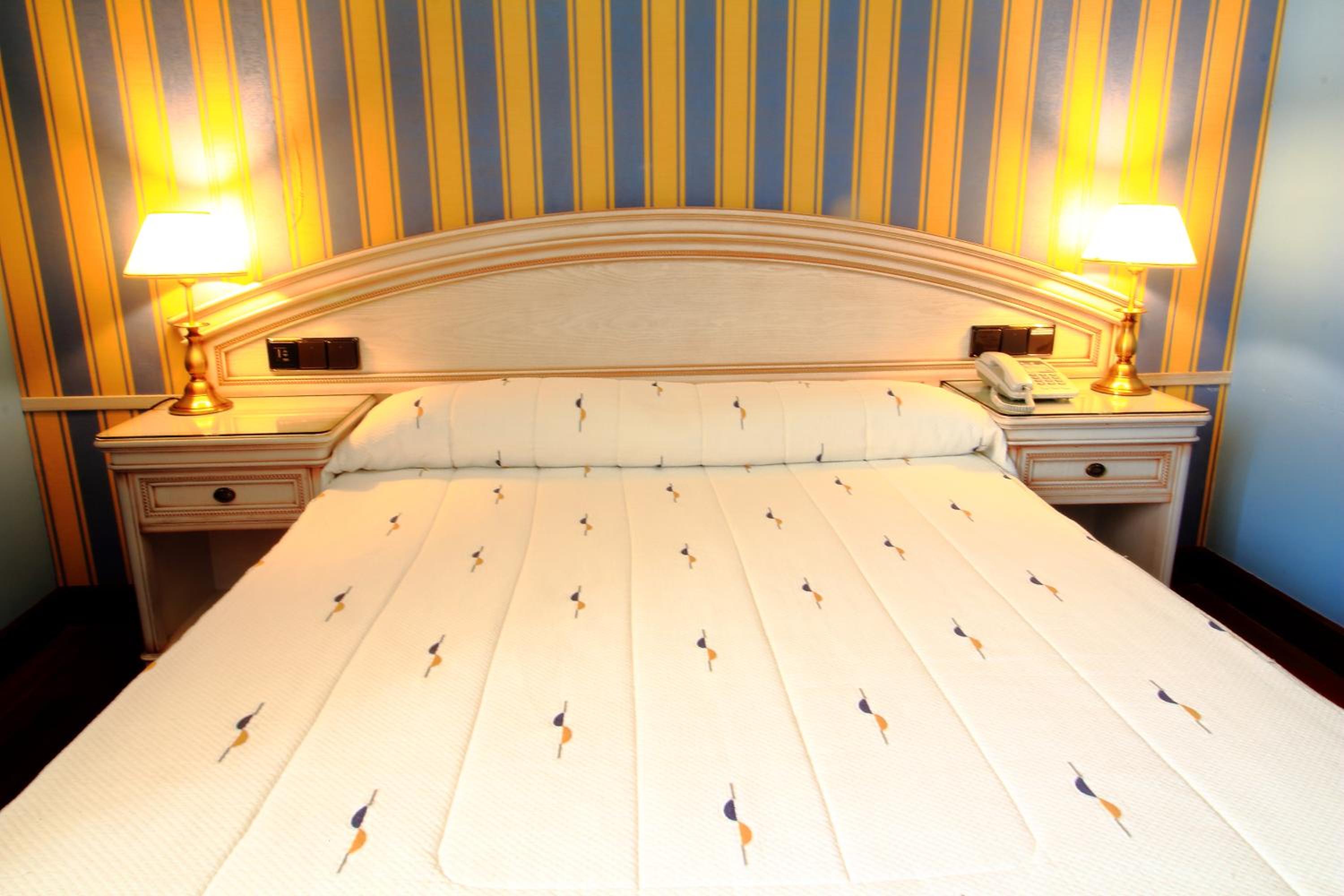 Habitación Estándar con Cama Queen
