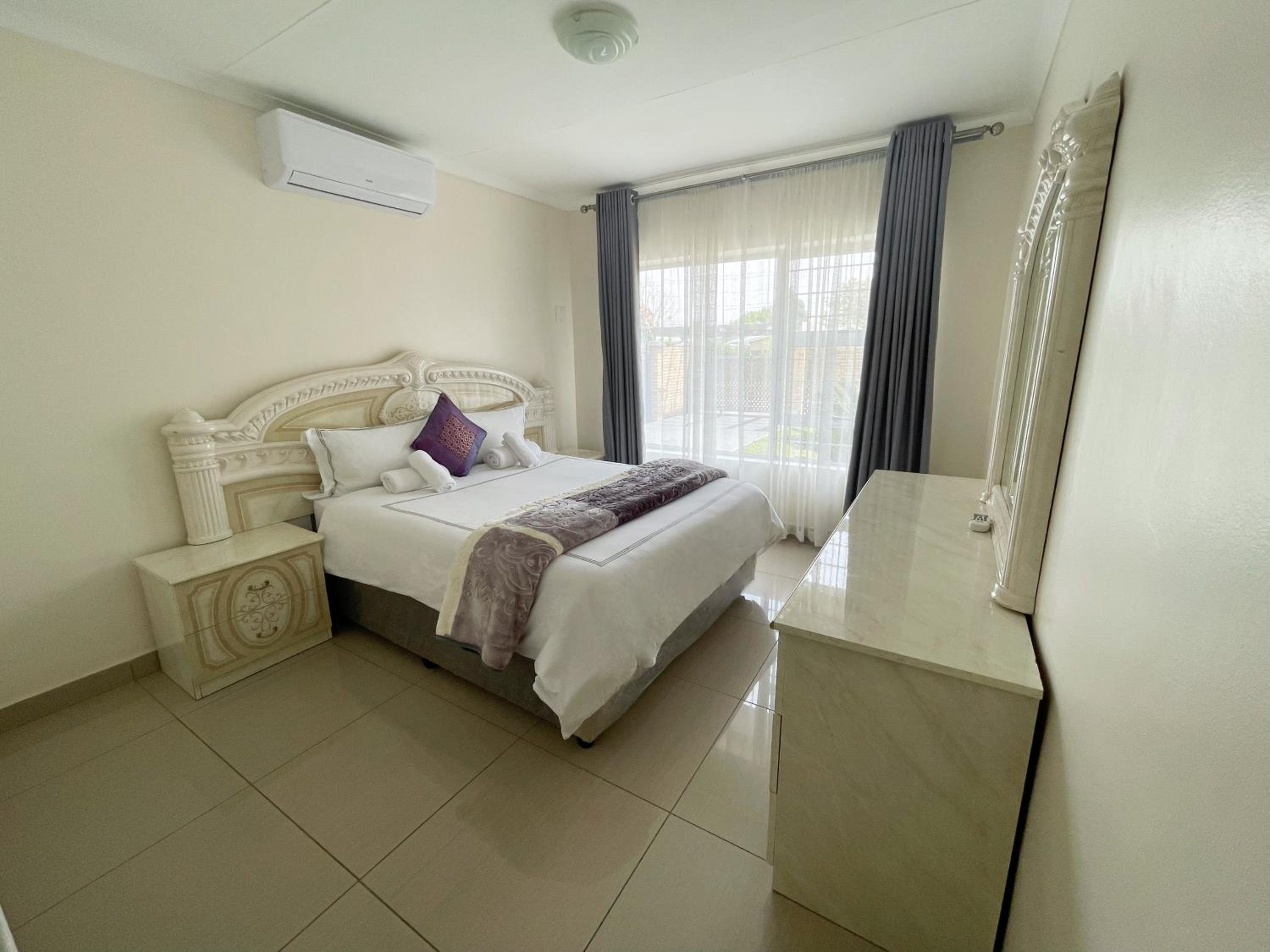 Three-Bedroom Apartment - Photo 2