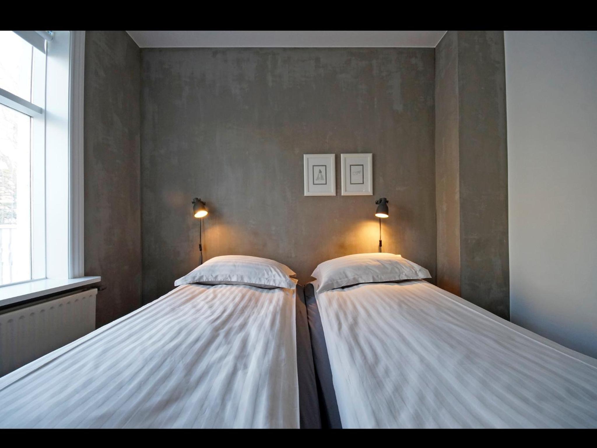 4 bedroom apartment with private parking at Urdarstígur 15