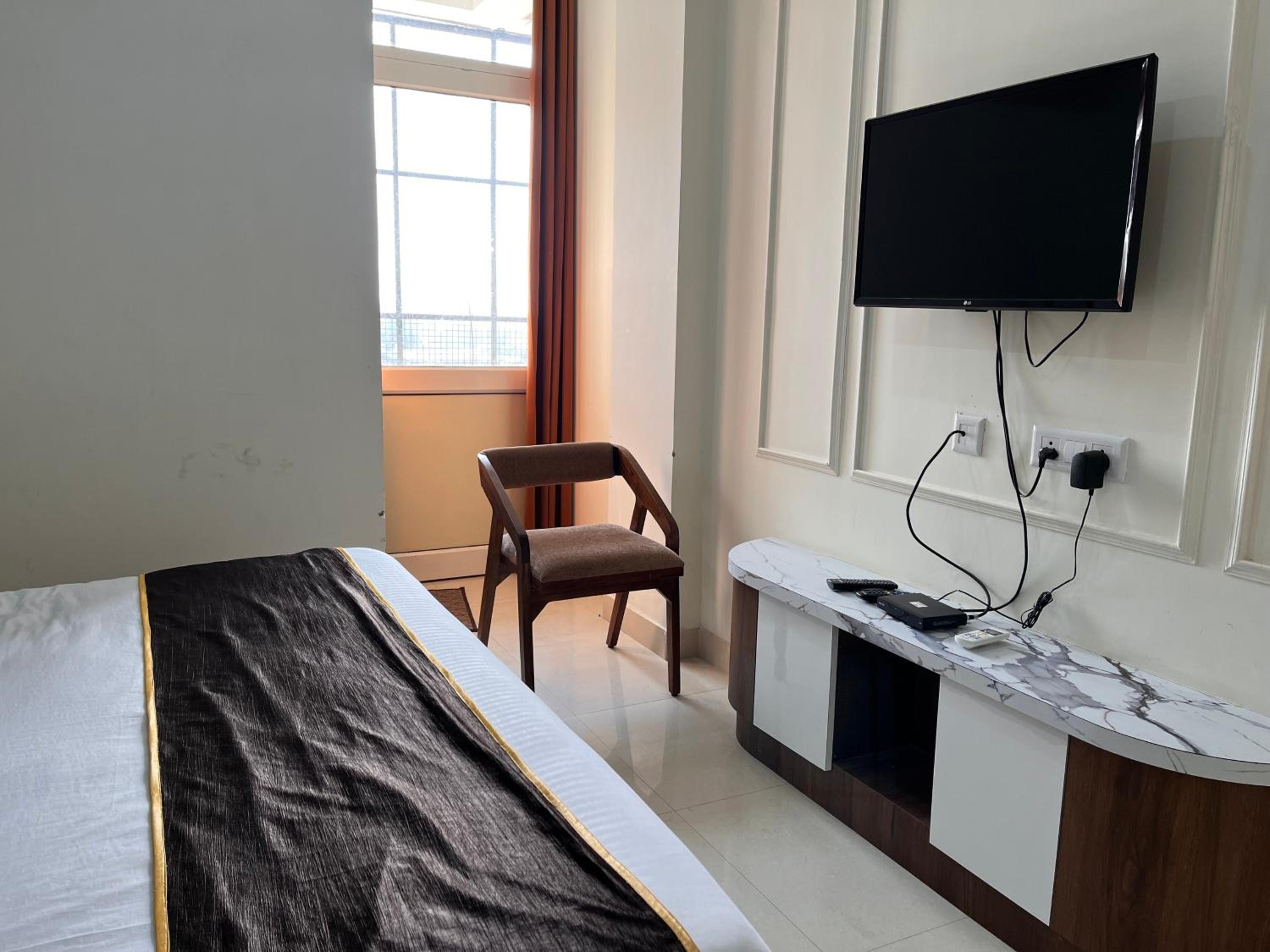 Deluxe Room - Photo 4