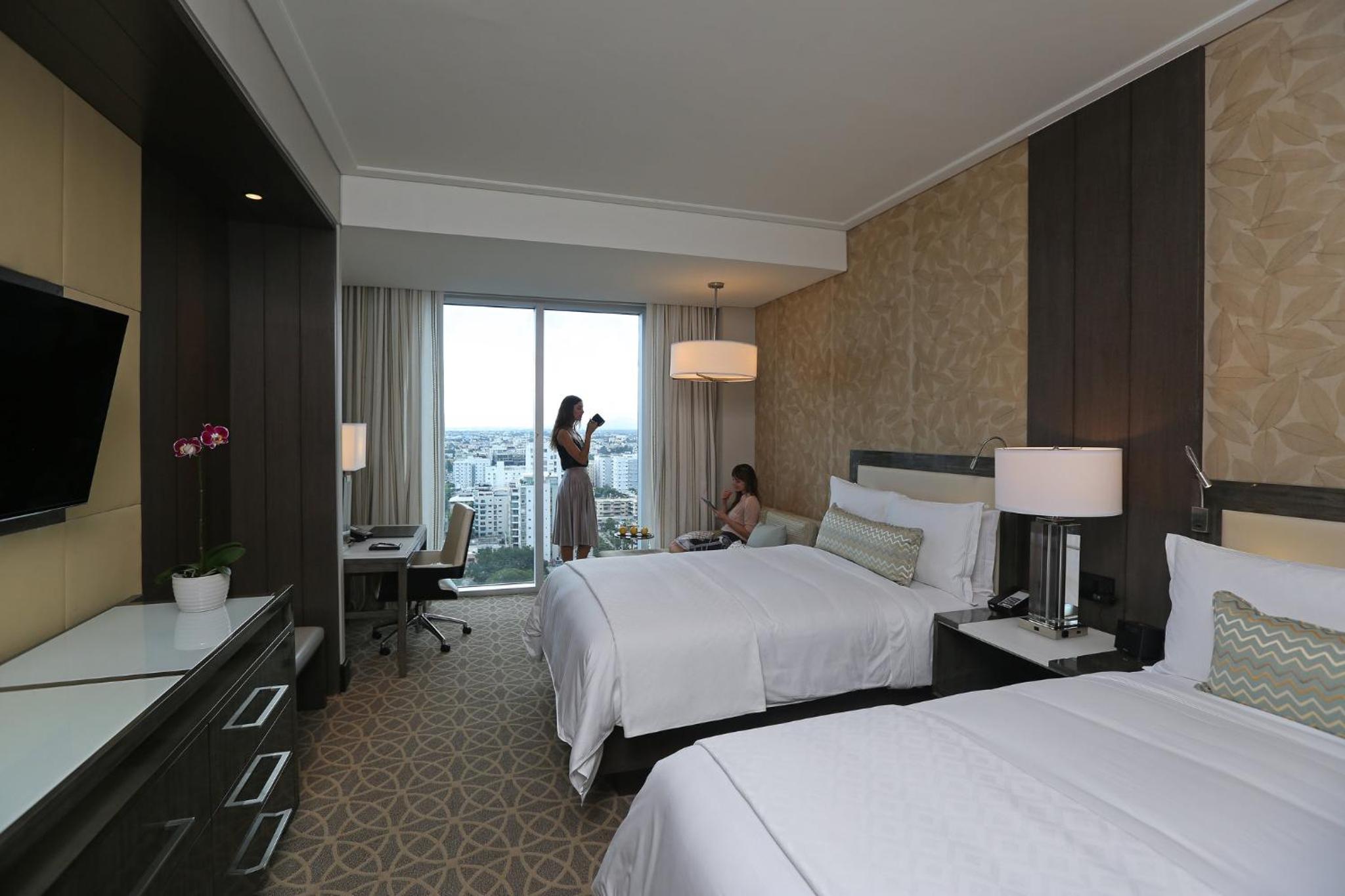 Classic Double Room with Two Double Beds and Pool View thumbnail 6