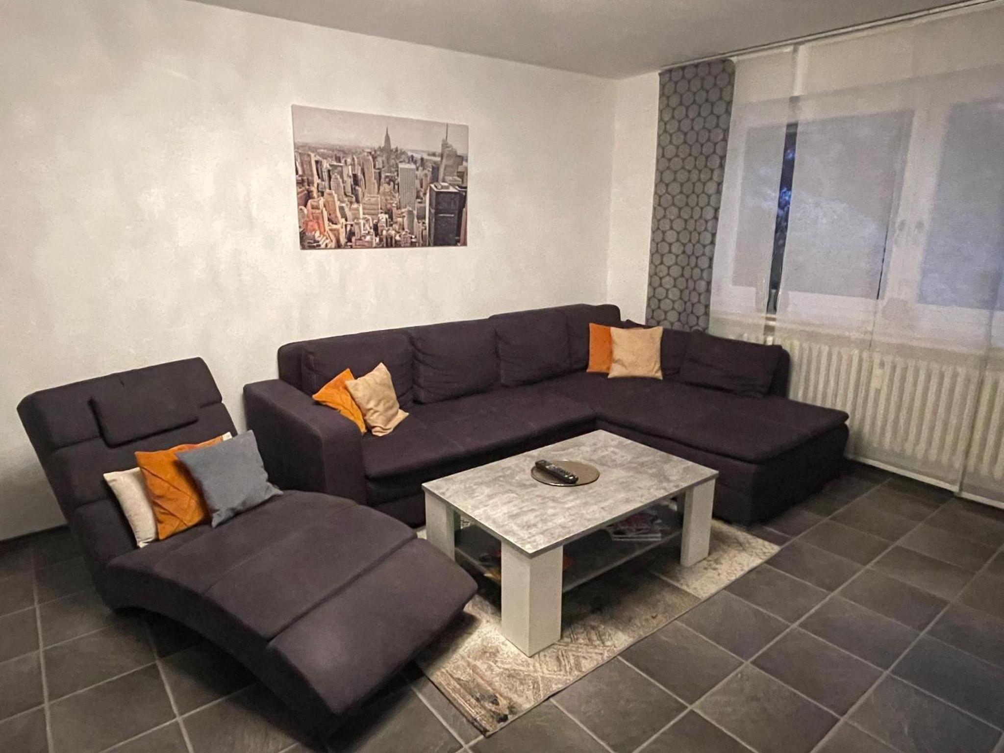 Three-Bedroom Apartment - Photo 2