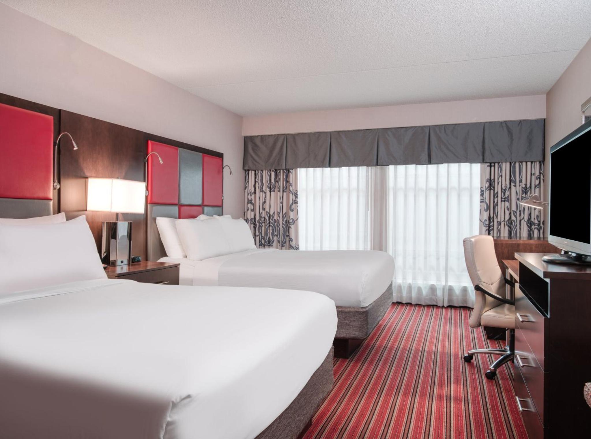 Standard Queen Room With Two Queen Beds And Pool View