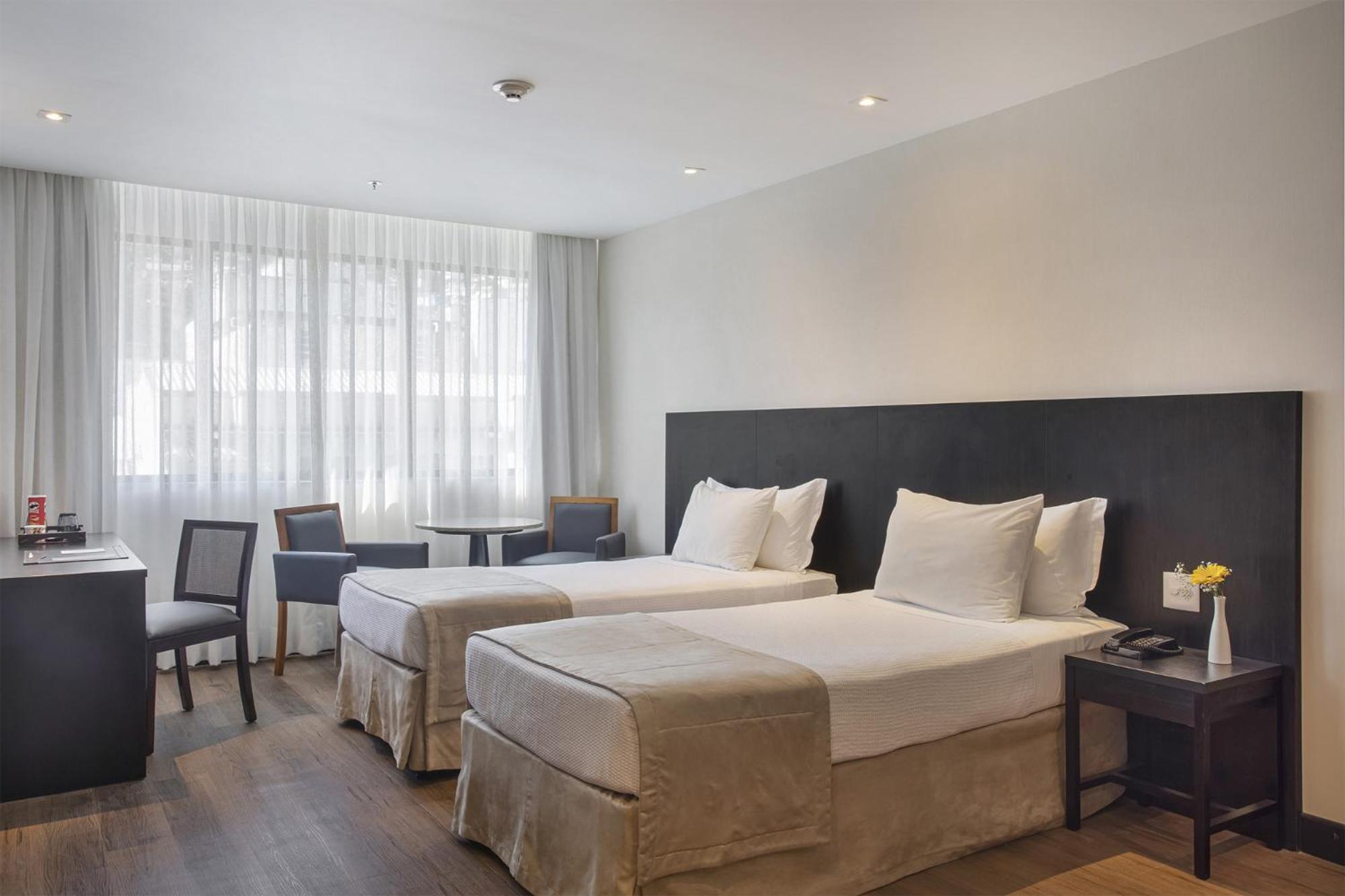Standard Twin Room - Photo 7